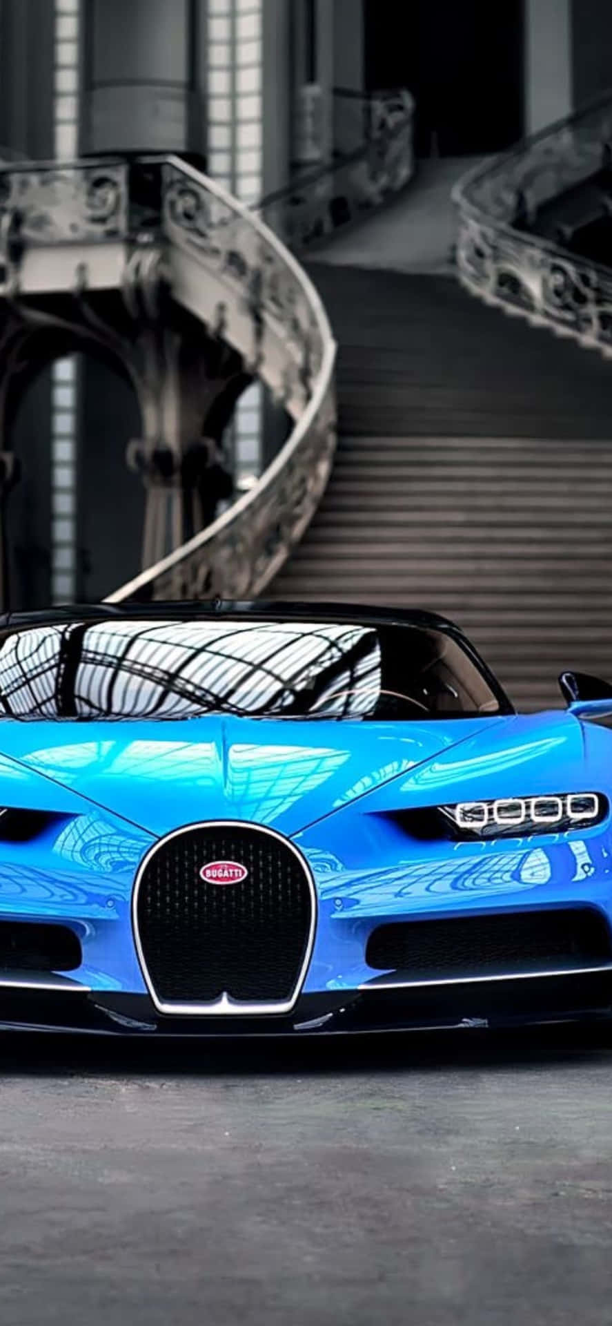 "Own the latest Iphone XS with this sleek and sophisticated Bugatti design background."