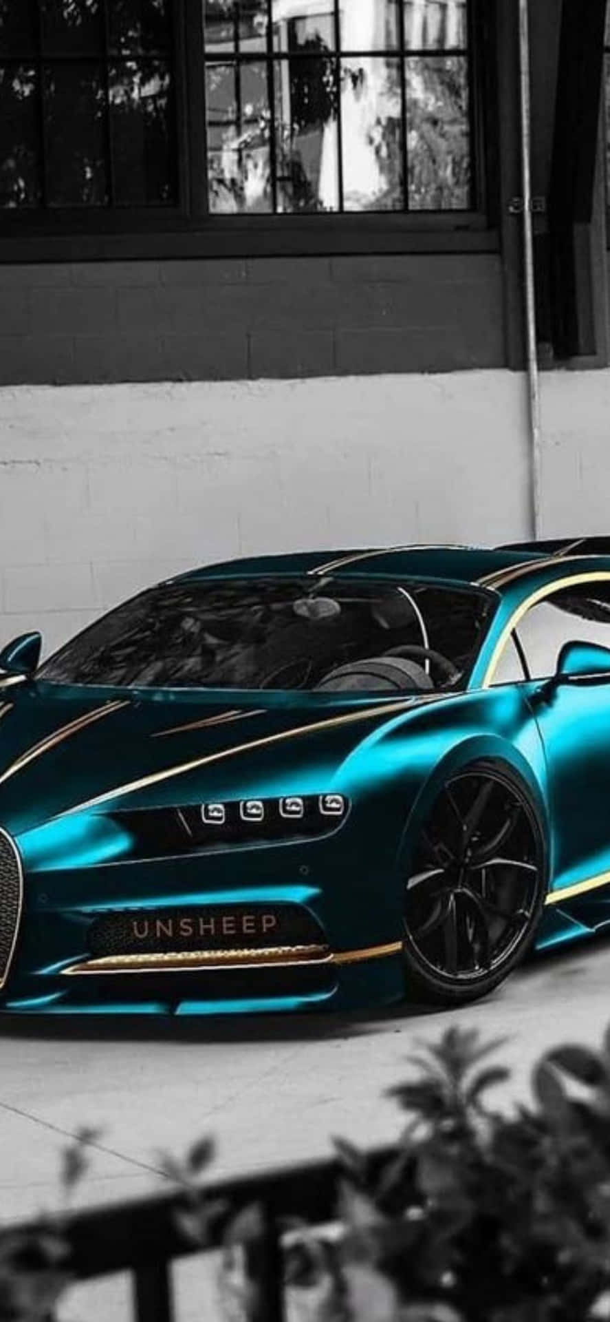 Luxurious Bugatti paired with modern Iphone Xs