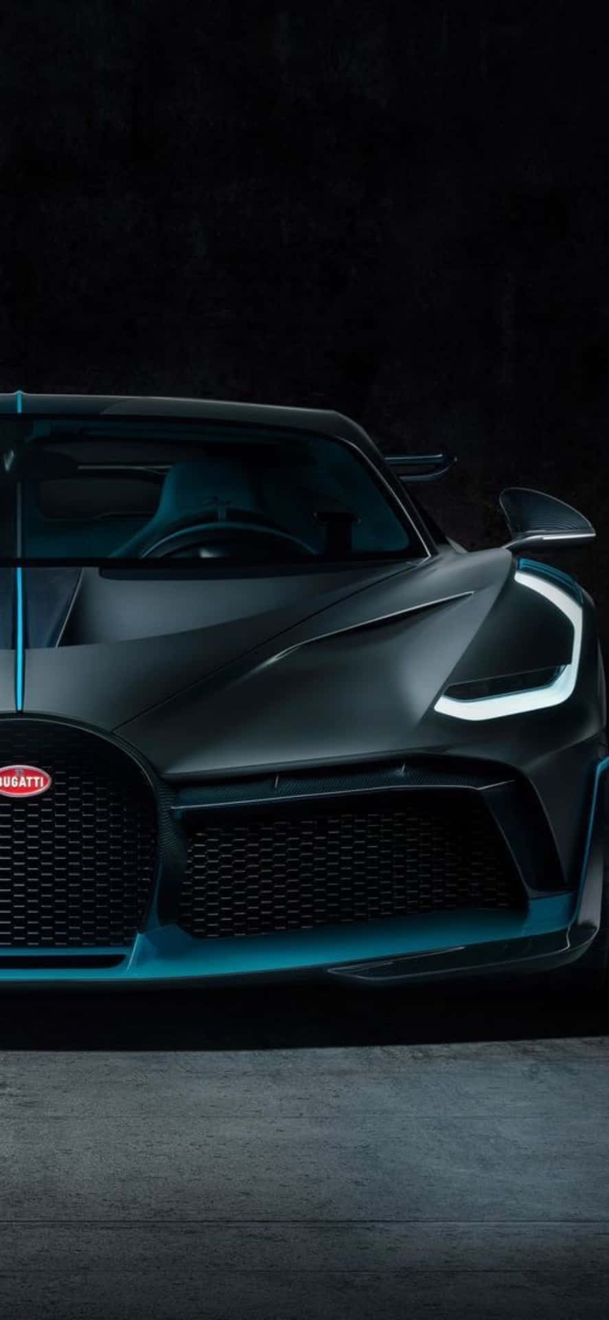 The Bugatti Chiron Is Shown In A Dark Room