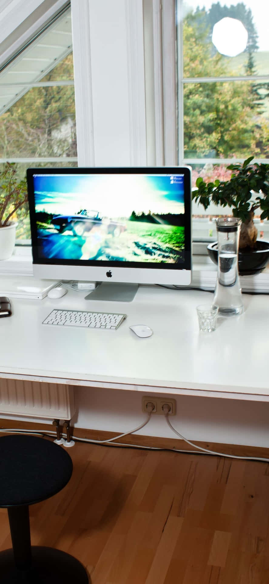 A White Desk With A Computer