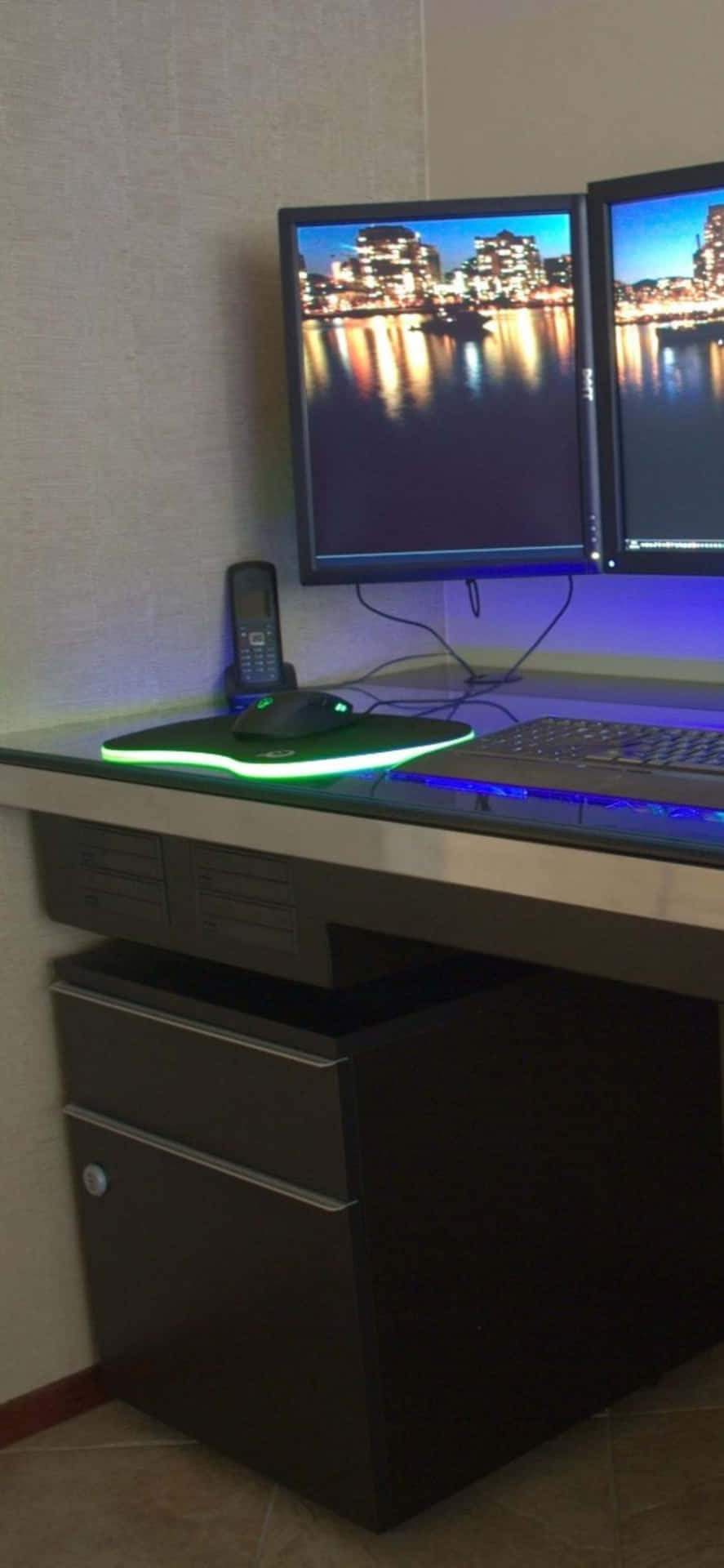 A Computer Desk With Two Monitors