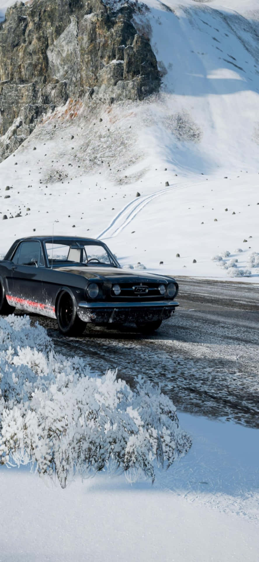 A Black Car Driving Down A Snowy Road