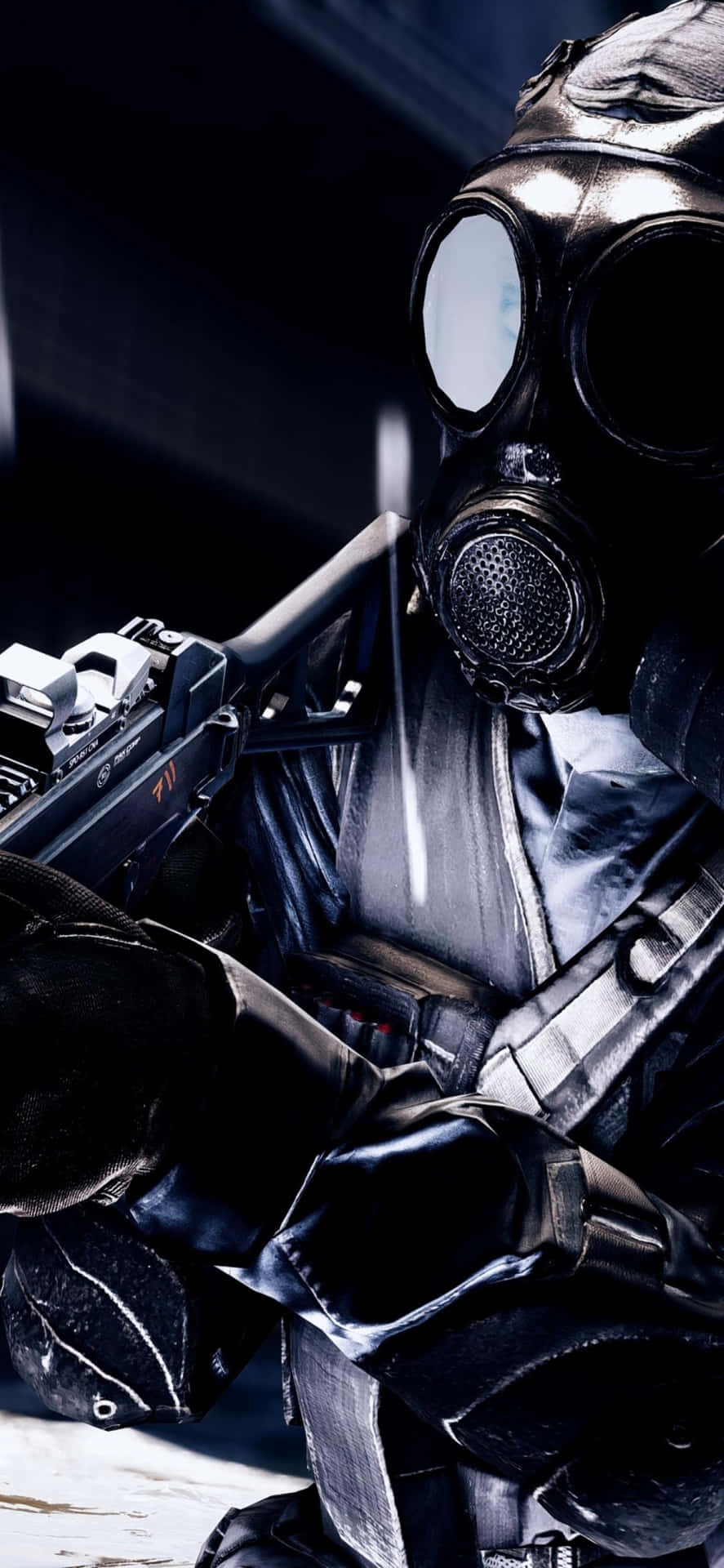 A Man In A Gas Mask Holding A Gun