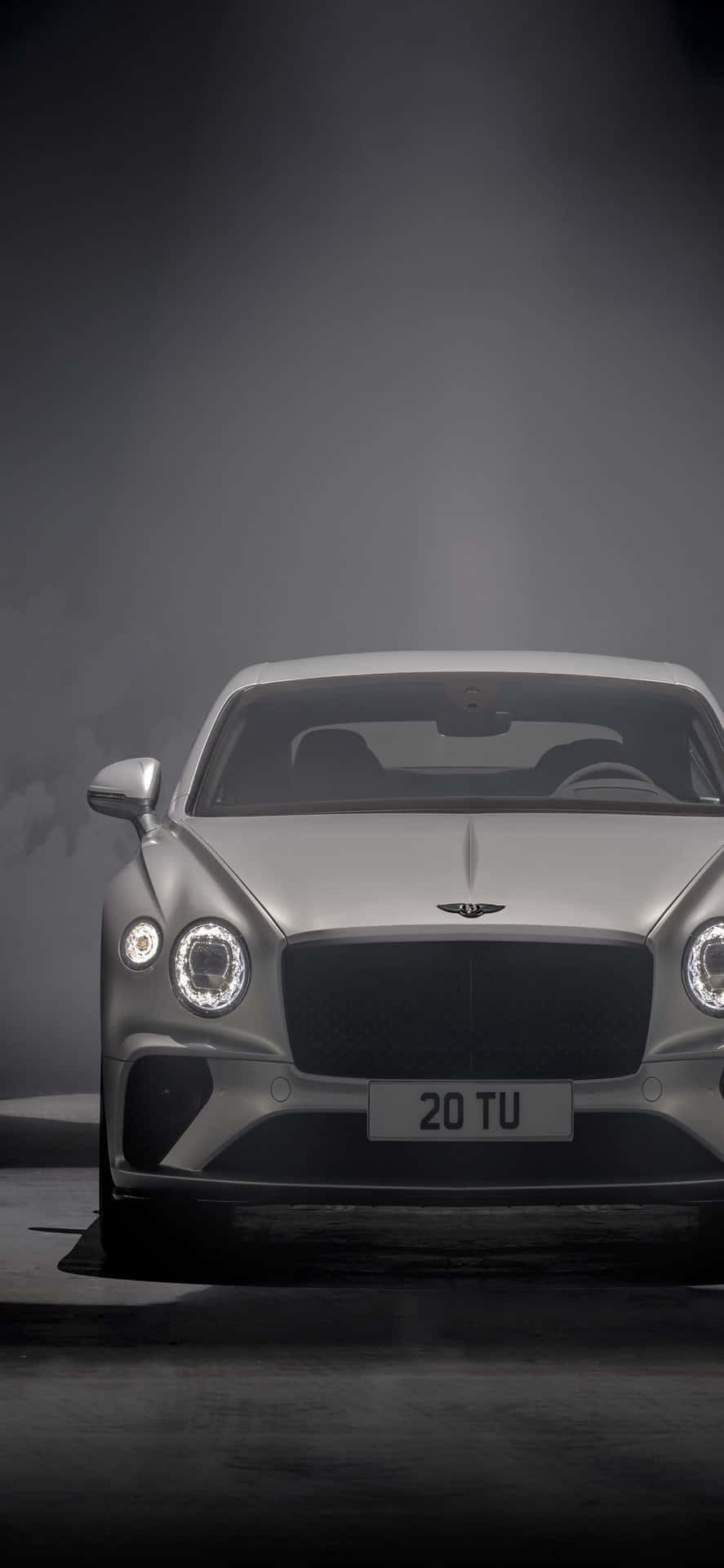 Eintauchenin Den Luxus: Ein Iphone Xs Max In Einem Bentley.