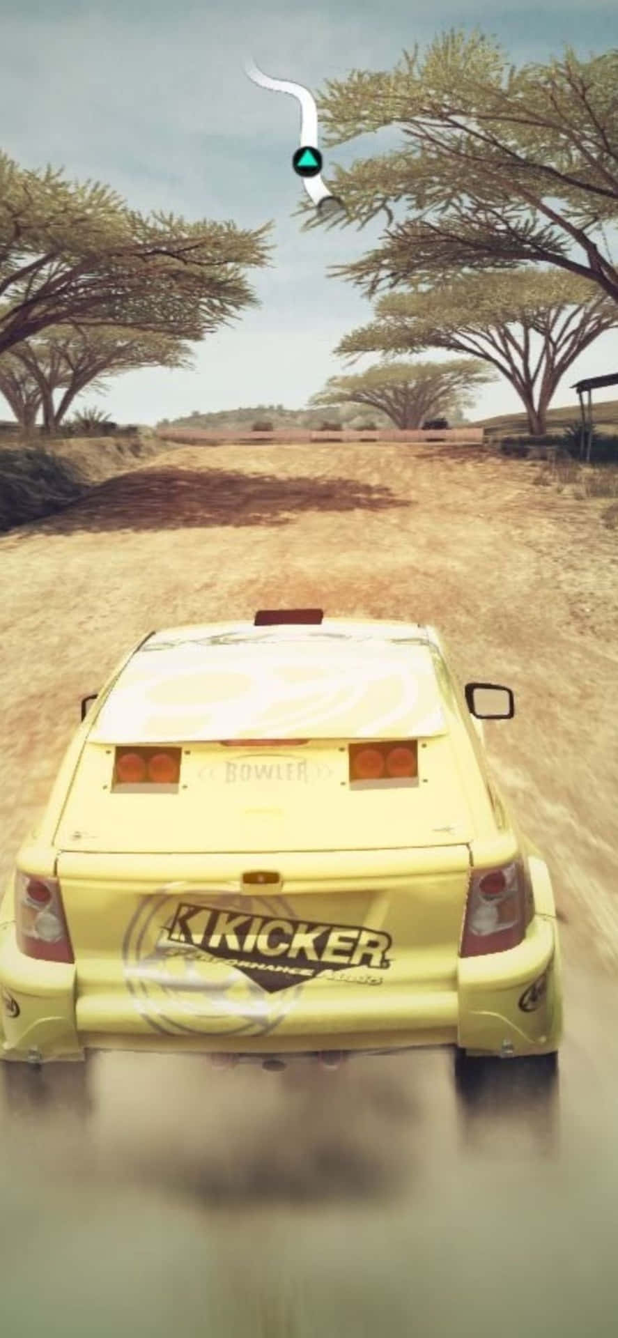 A Yellow Car Driving Through The Desert