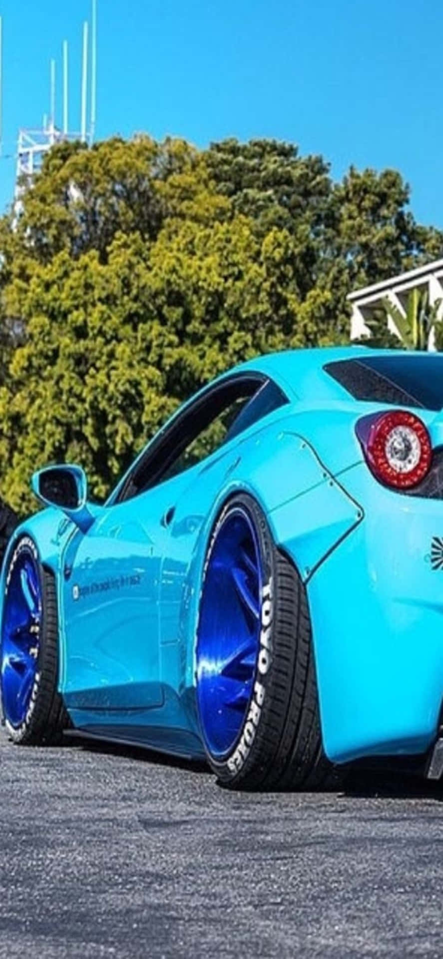 Papelde Parede Ferrari Para Iphone Xs Max Na Cor Azul Claro Com O Modelo Ferrari 458.