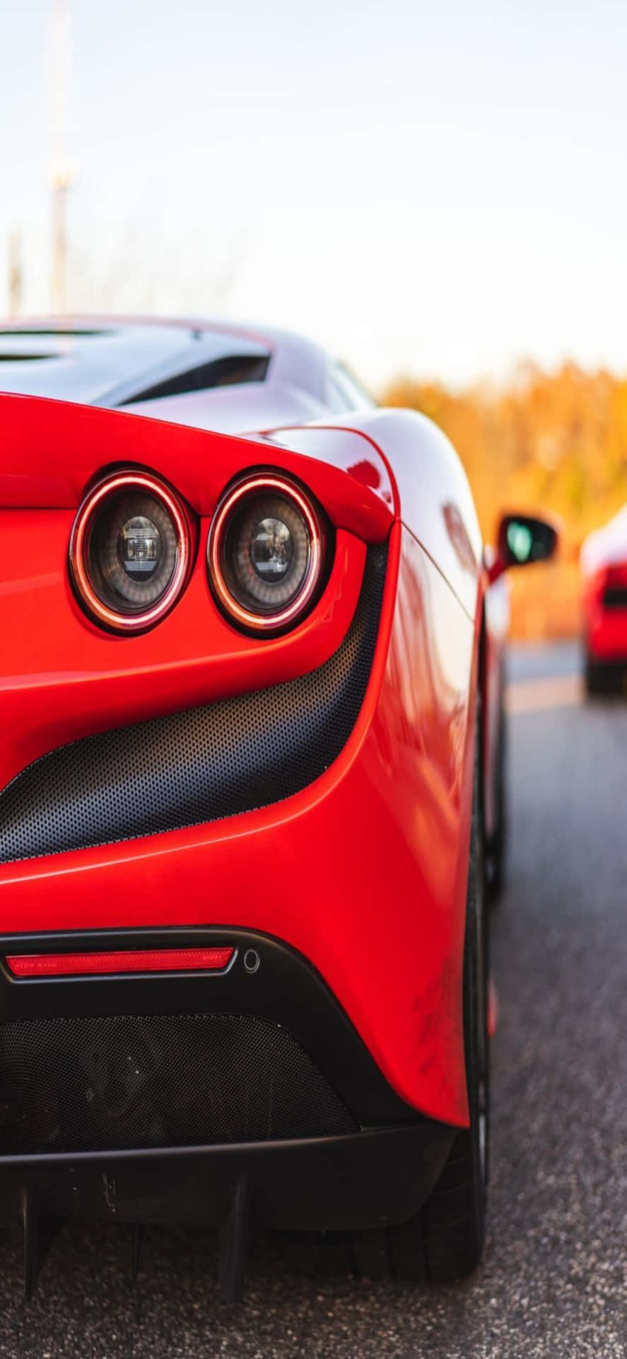 Iphonexs Max Ferrari Hintergrund Rückseite Eines Roten Ferrari F8 Tributo