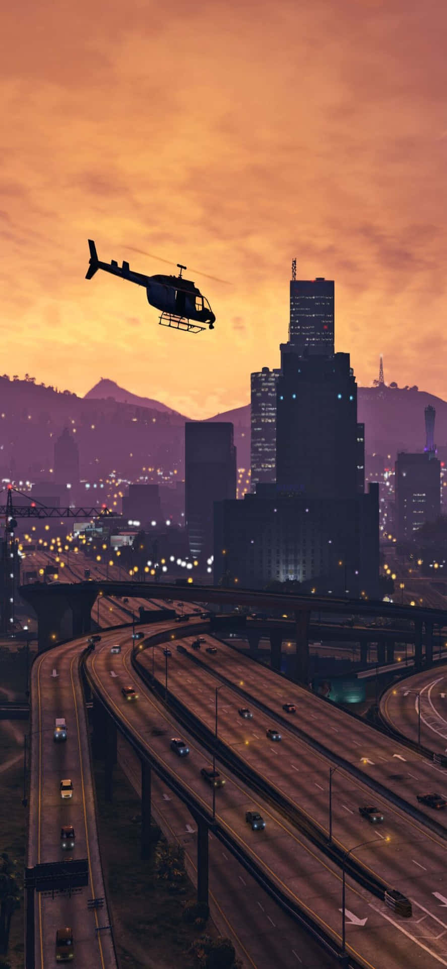 Iphonexs Max Bakgrundsbild Av Grand Theft Auto V, Där En Helikopter Flyger Runt På Motorvägen.