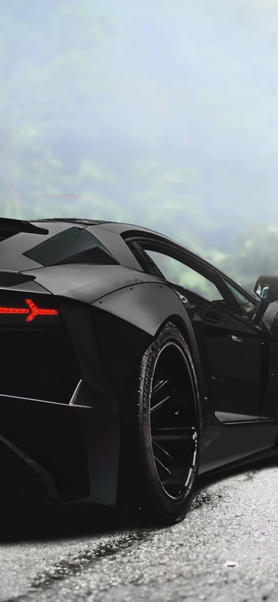 Iphonexs Max Lamborghini Svart Bakgrundsbild Från Baksidan.
