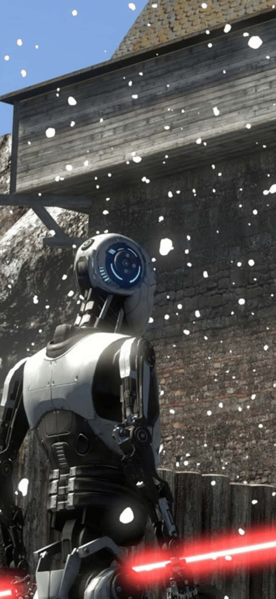 a star wars robot is standing in the snow