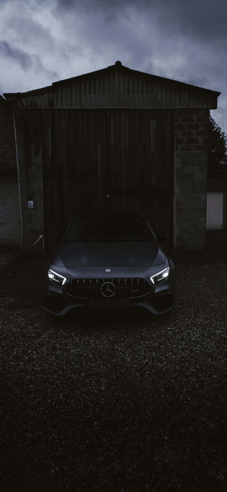 Frontvisning sort Iphone Xs Mercedes Amg baggrund