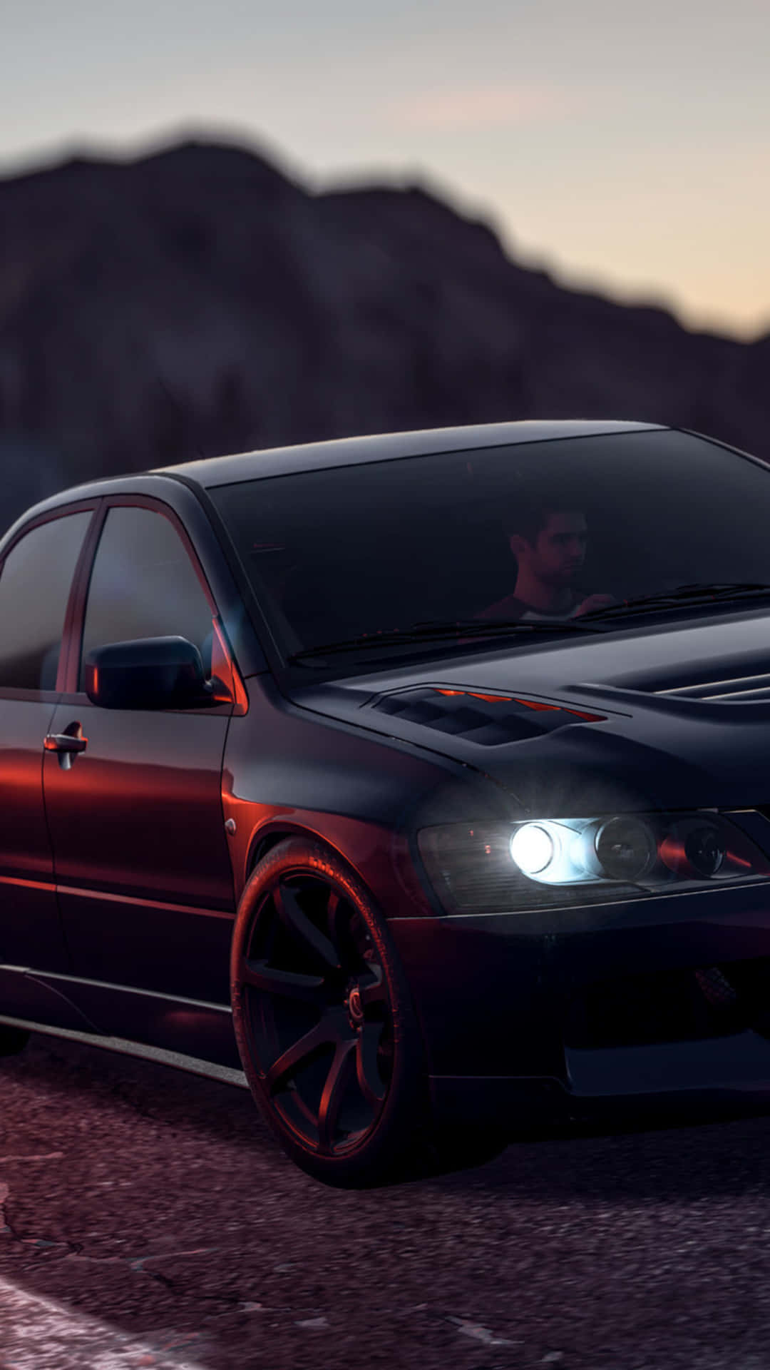 Iphonexs Bakgrundsbild För Need For Speed Payback Med En Mörkfärgad Mitsubishi Lancer Evolution.