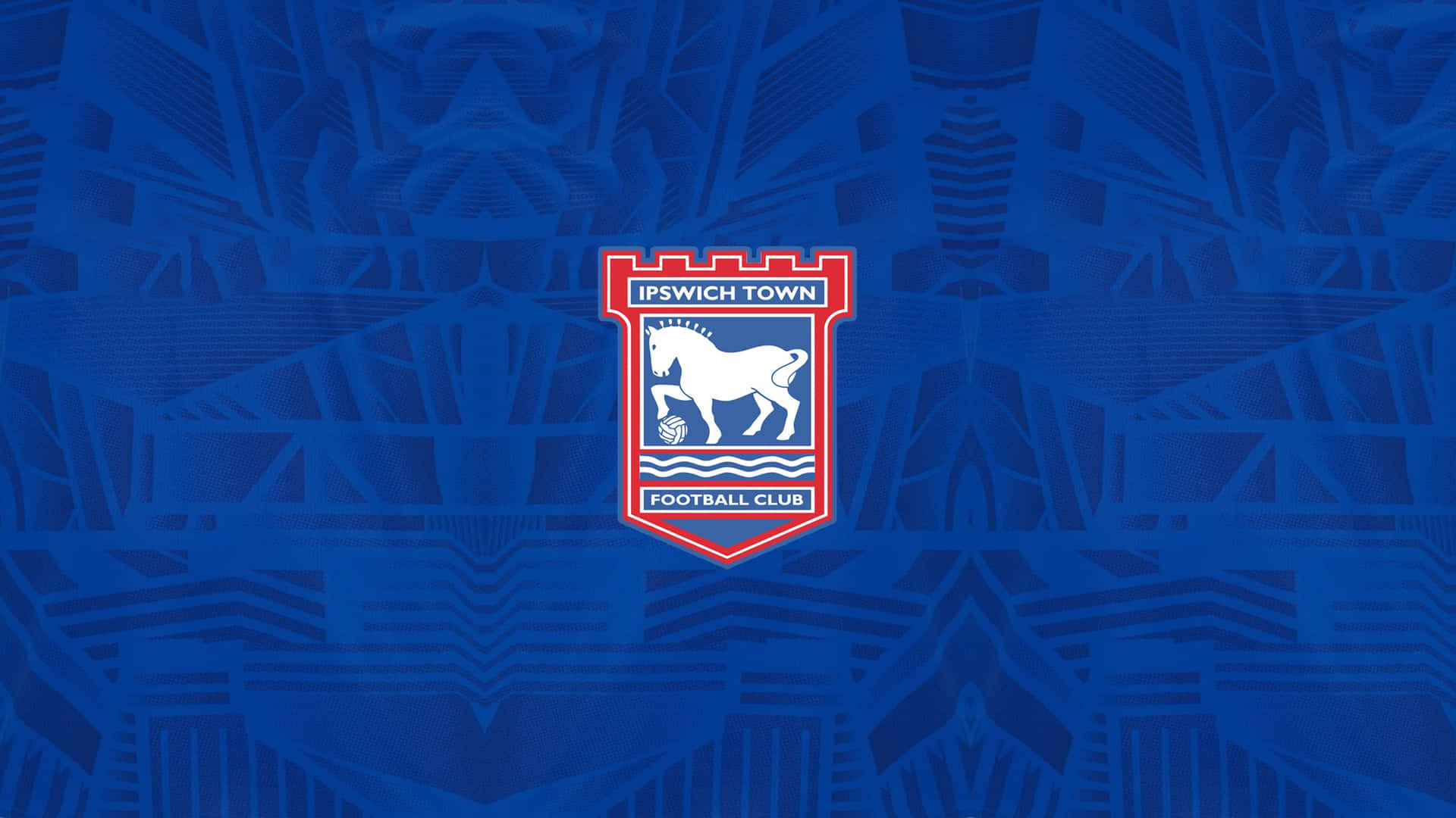 Ipswich Town Football Club Players Celebrating on the Field Wallpaper
