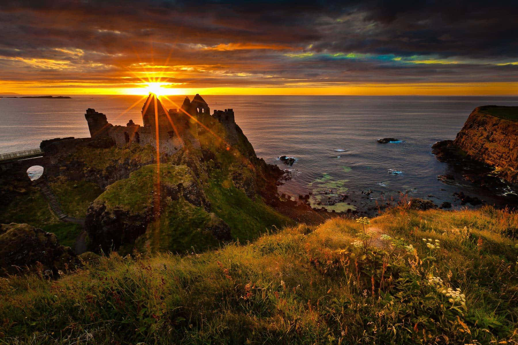 Sunset Over Cliff Ireland Desktop Wallpaper