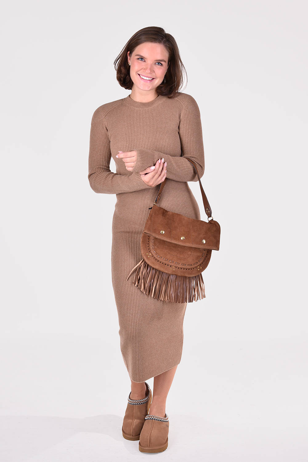 Fashionable Woman Wearing Iro Long Brown Dress Wallpaper