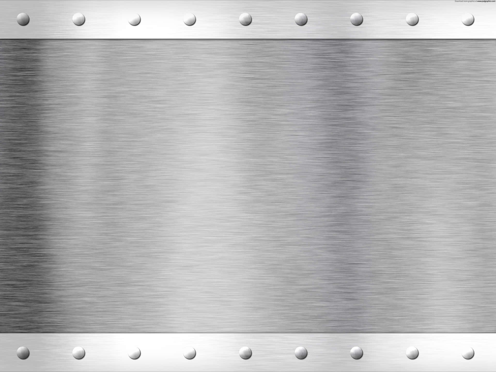 A Metal Plate With Rivets On It
