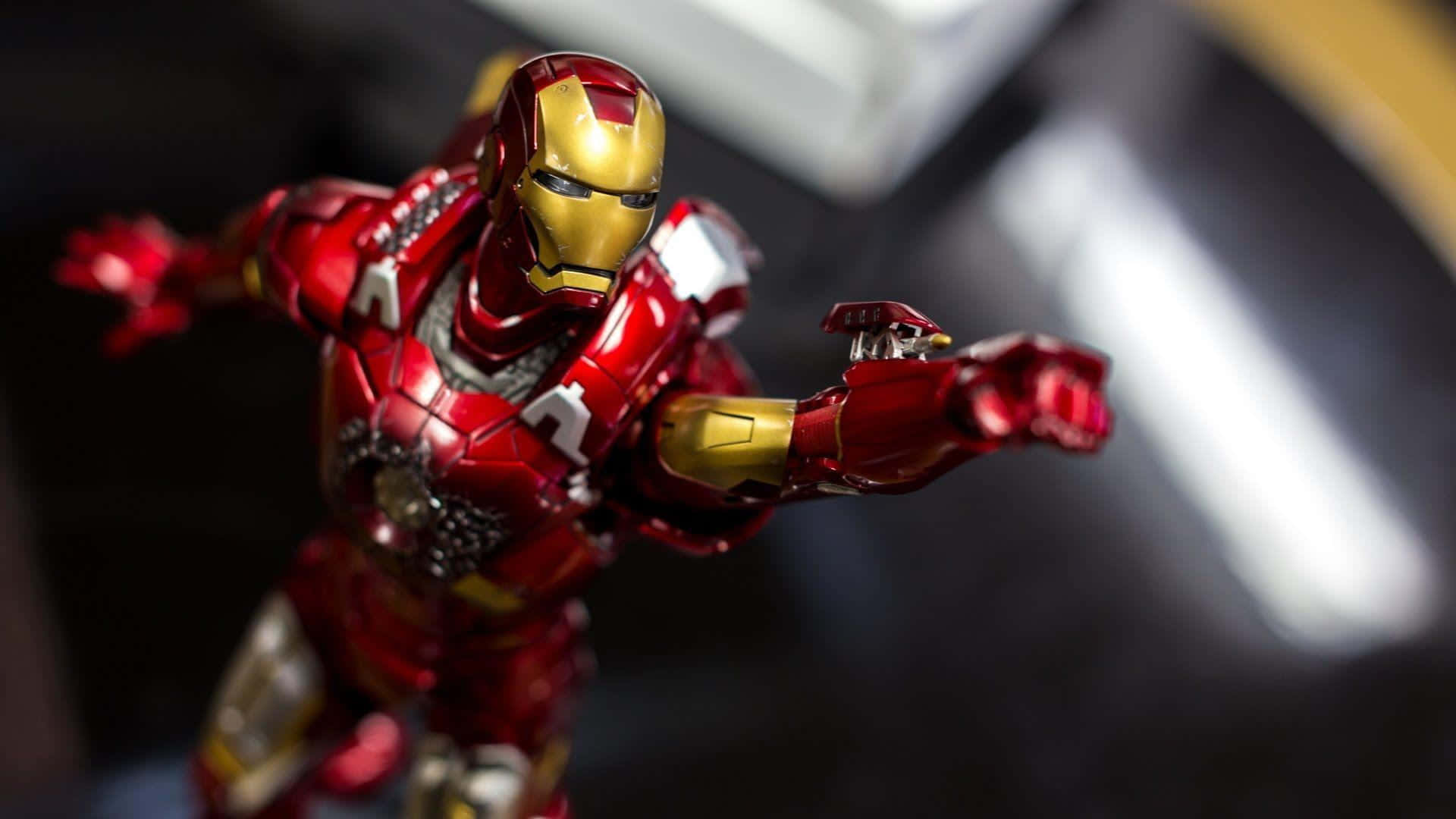 Get Ready to Create Your Own Epic Adventures with Iron Man Action Figures Wallpaper