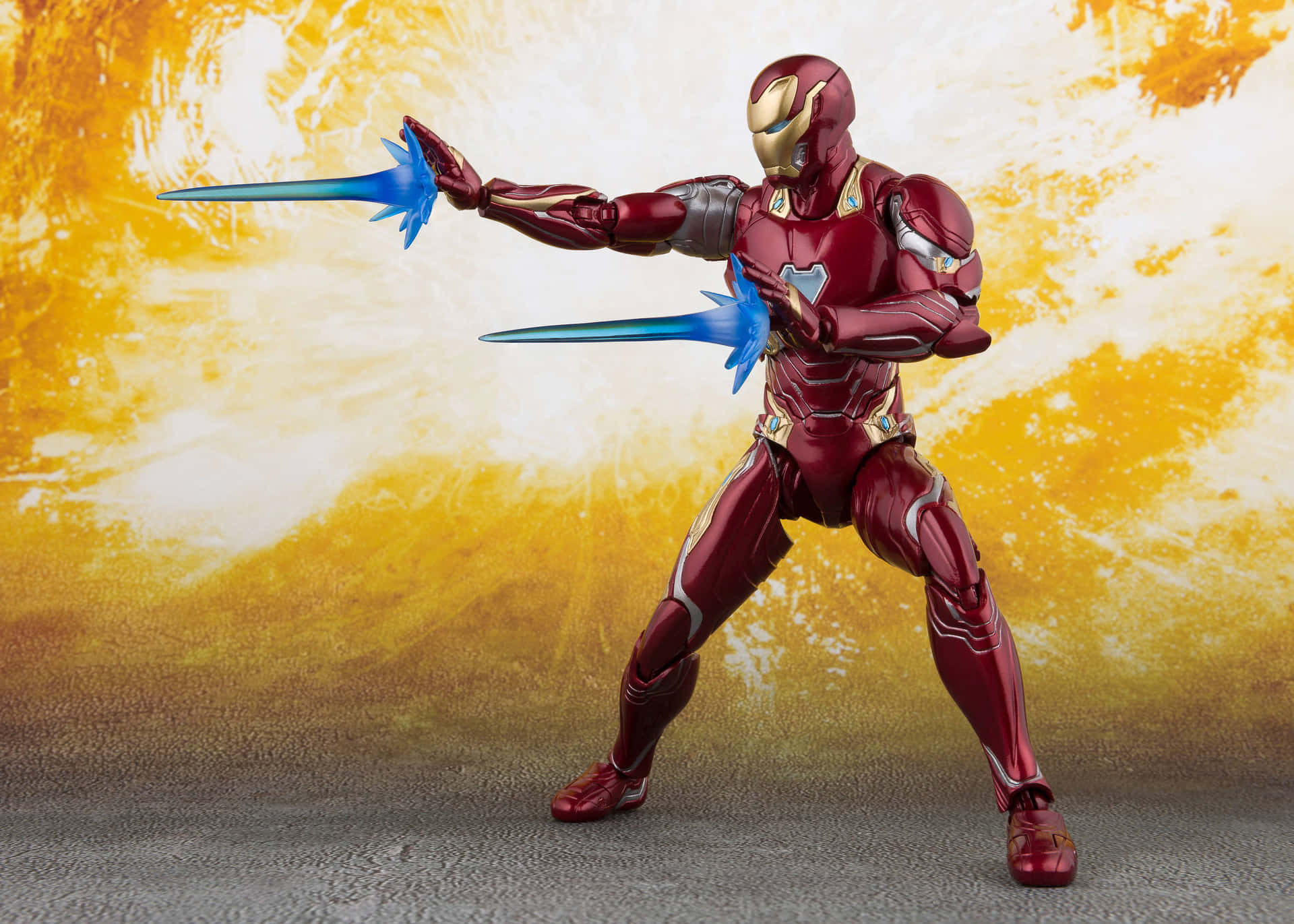 Protect your home with these awesome Iron Man Action Figures Wallpaper