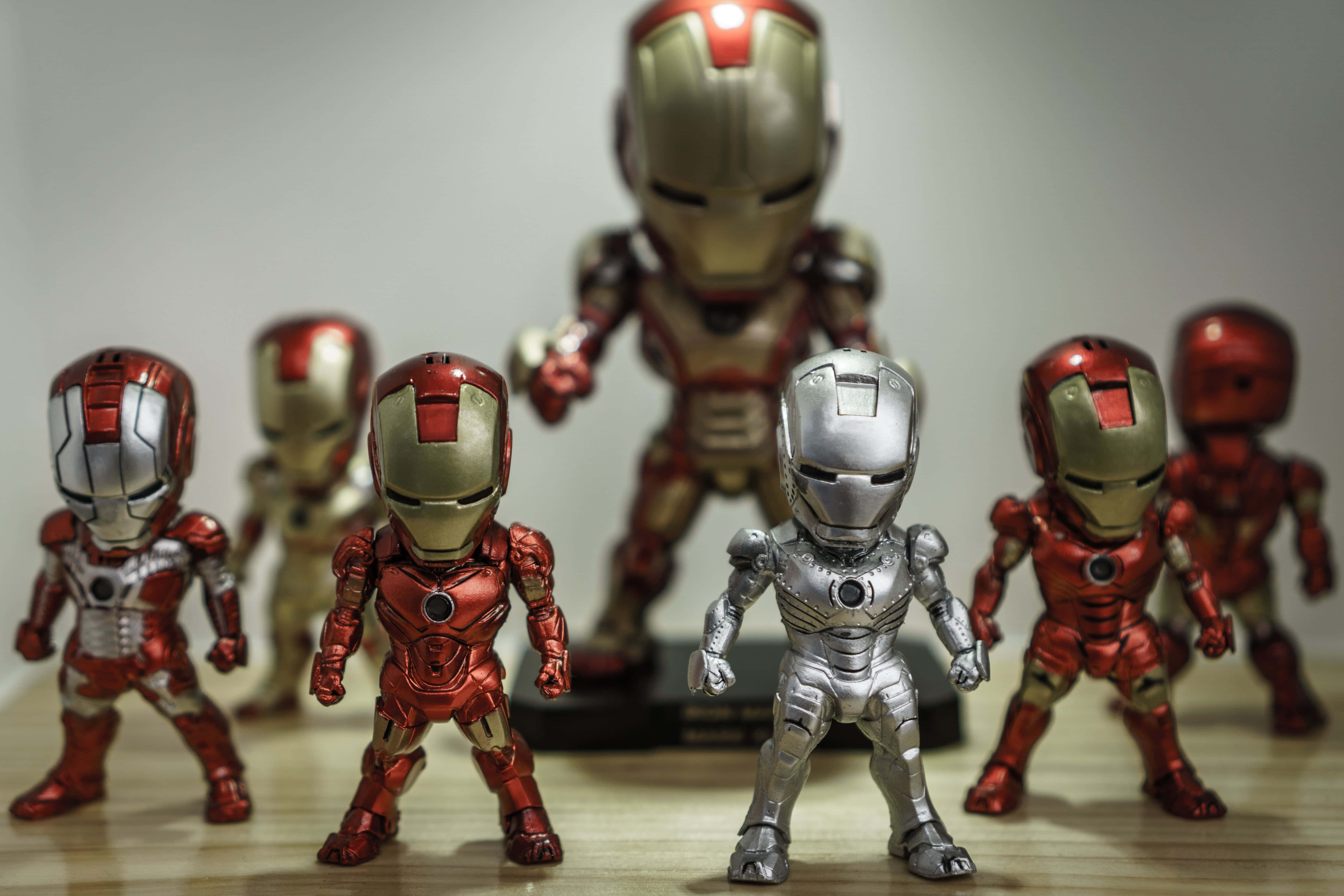 Collect and display your favorite Iron Man action figures Wallpaper
