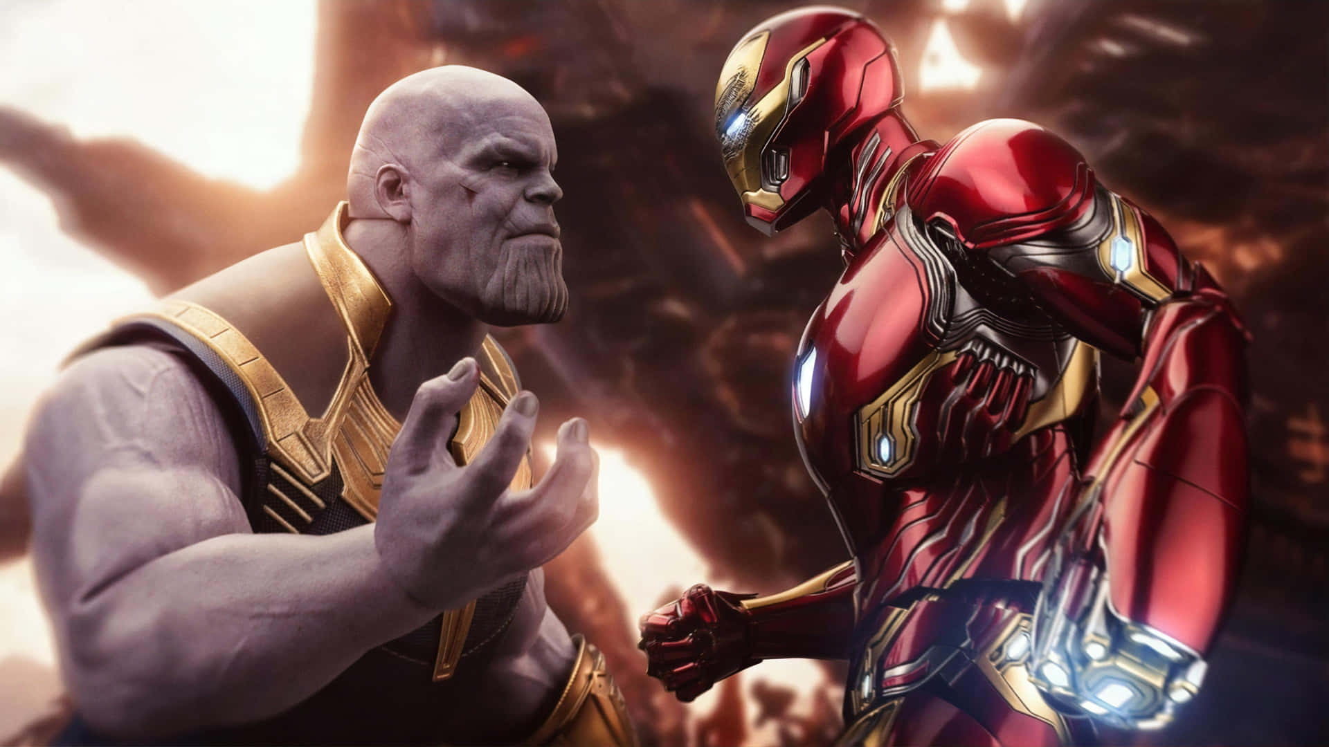 Iron Man and Thanos - Greatest Rivals in the Universe Wallpaper