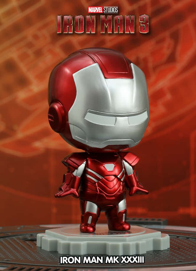 Bring justice and style to your desk with Iron Man Bobbleheads Wallpaper
