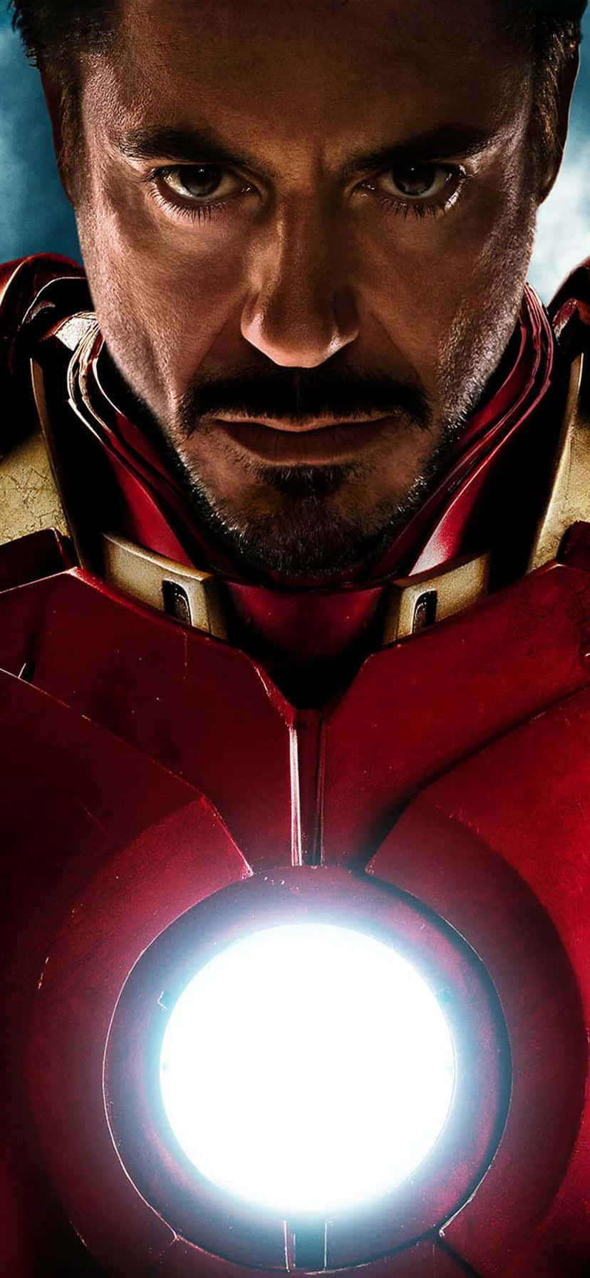 Iron_ Man_ Closeup_ Arc_ Reactor_ Glow Wallpaper