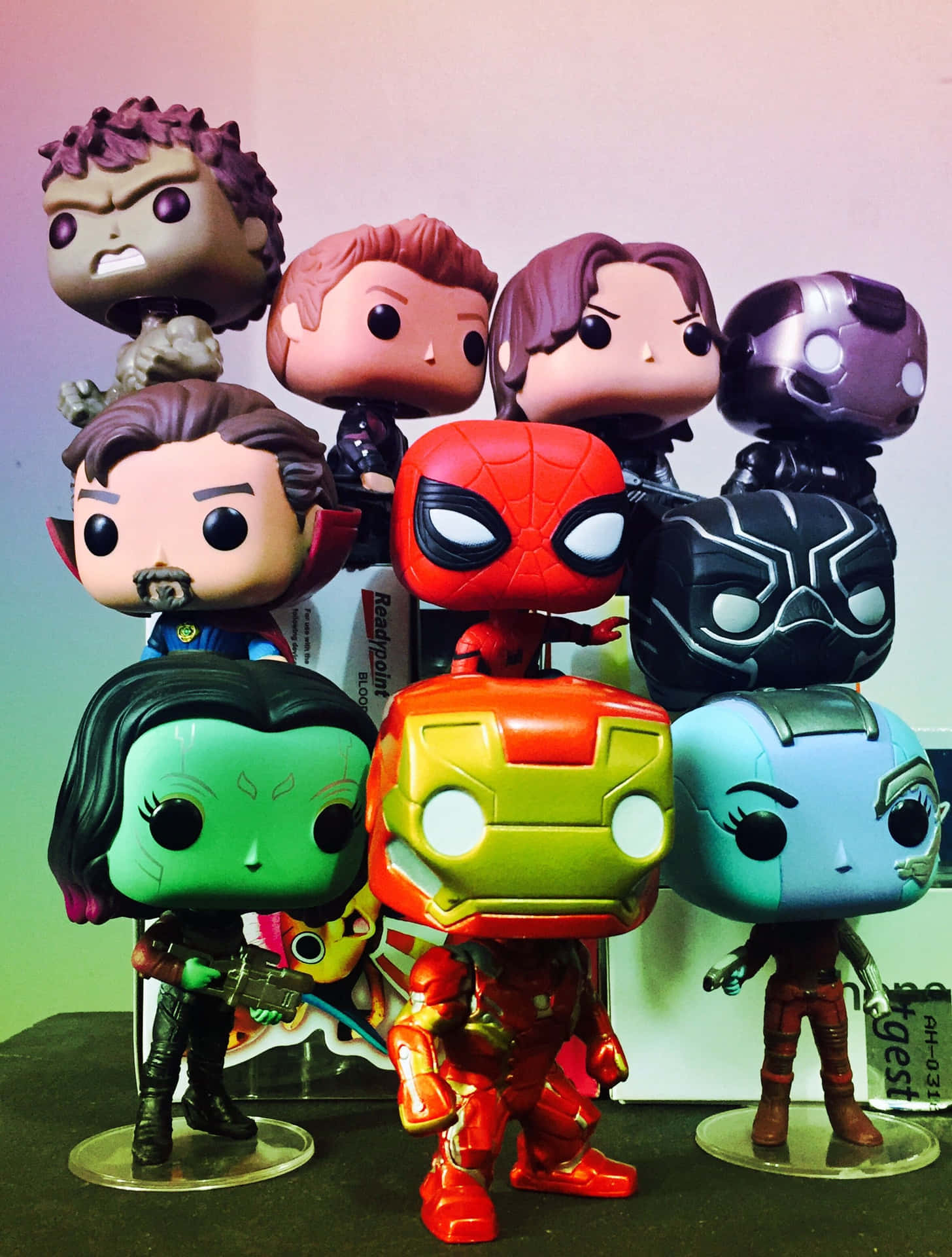 Step Into the World of Iron Man with These Fun Pop Figures Wallpaper