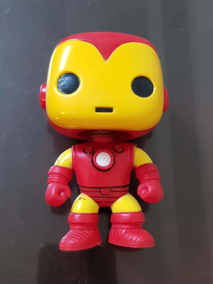 "Collect the Whole Set of Iron Man Pop Figures!" Wallpaper