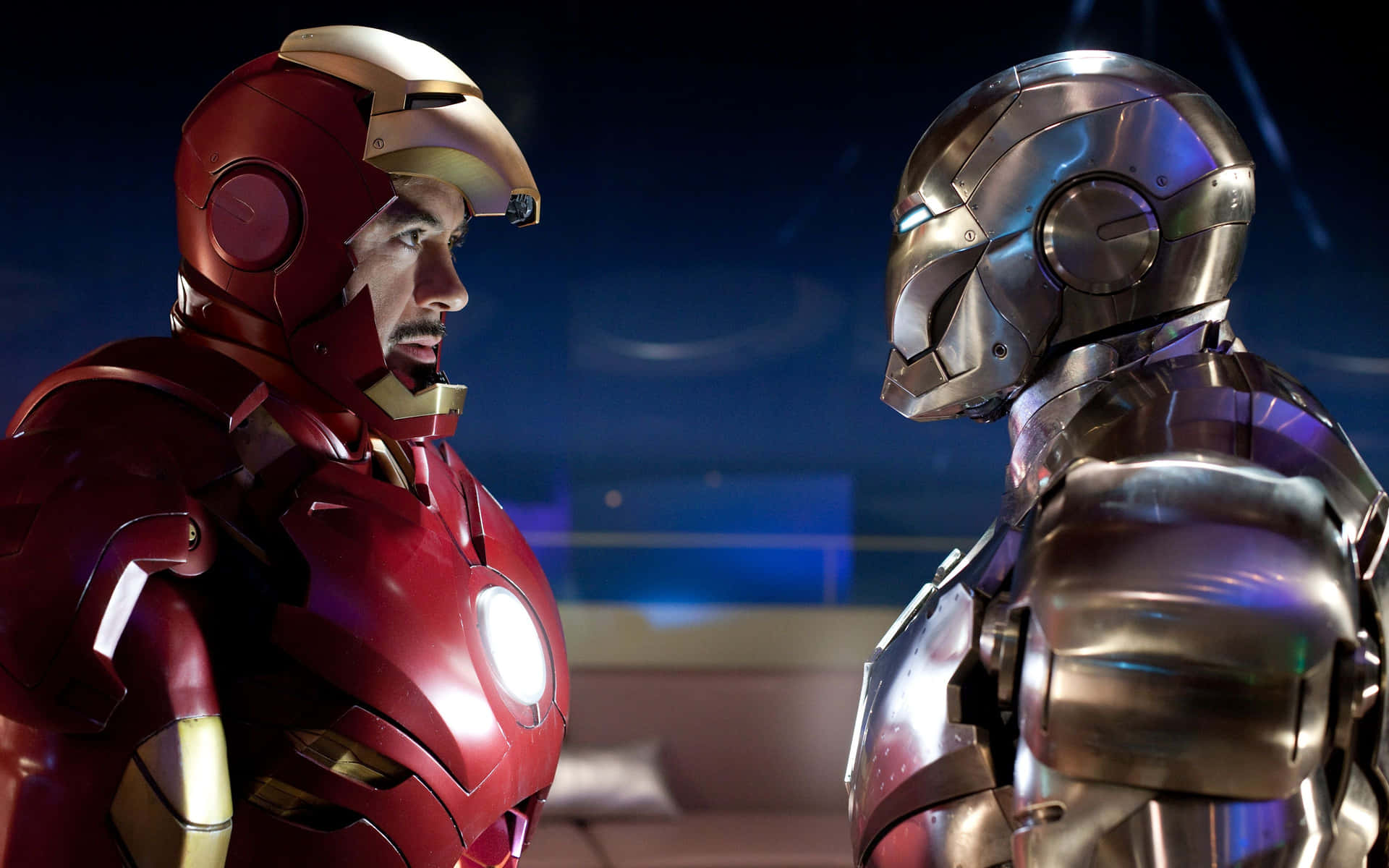 Tony Stark showcasing his Iron Man suit Wallpaper