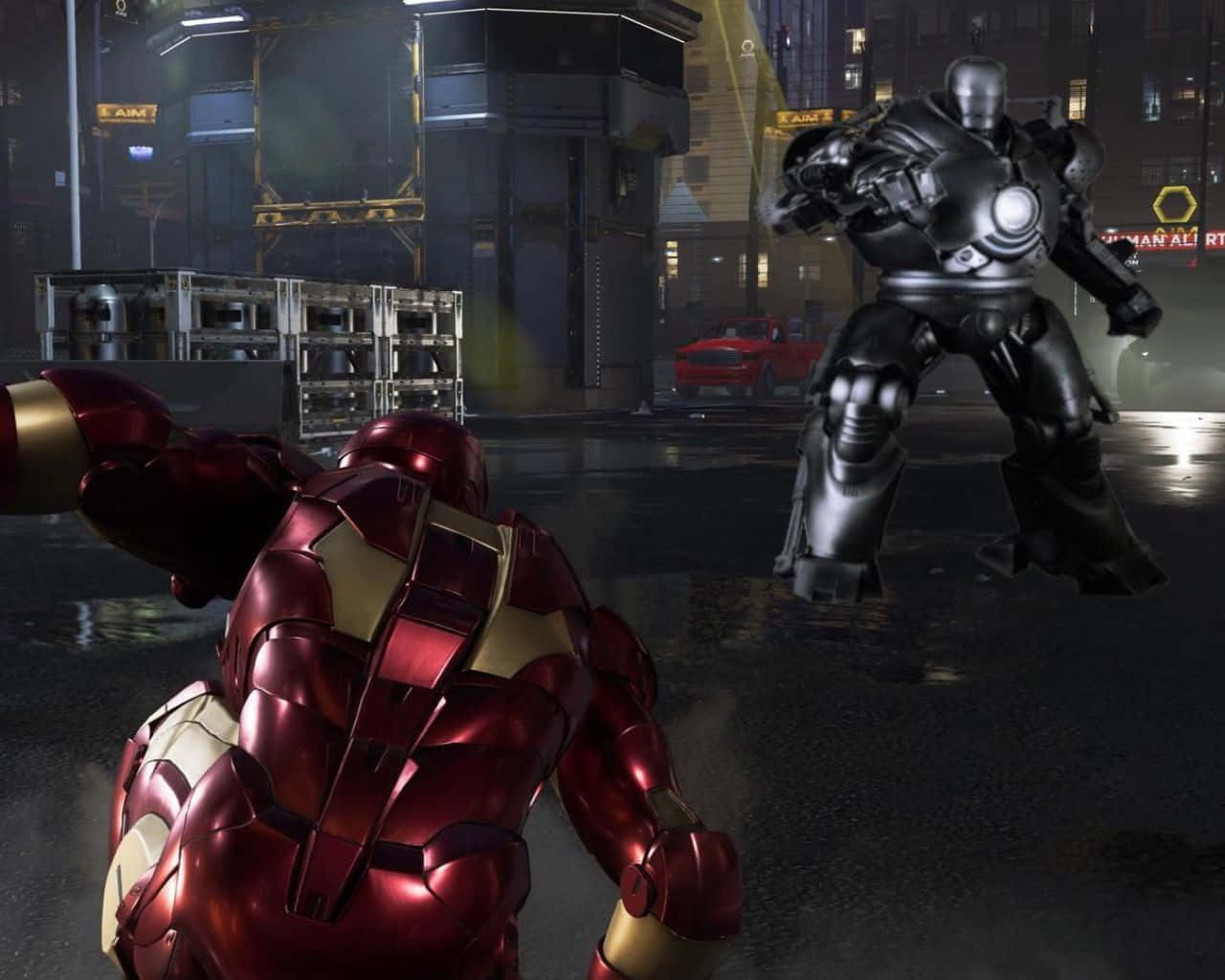 Iron Man and Iron Monger Go Head to Head in Epic Showdown Wallpaper