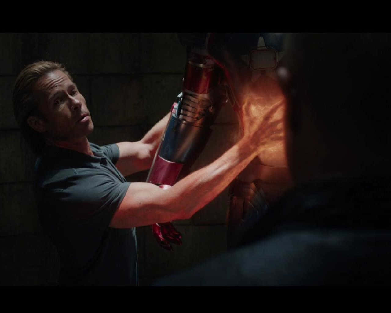 Iron Man and Killian in an Epic Battle of Good Vs. Evil" Wallpaper