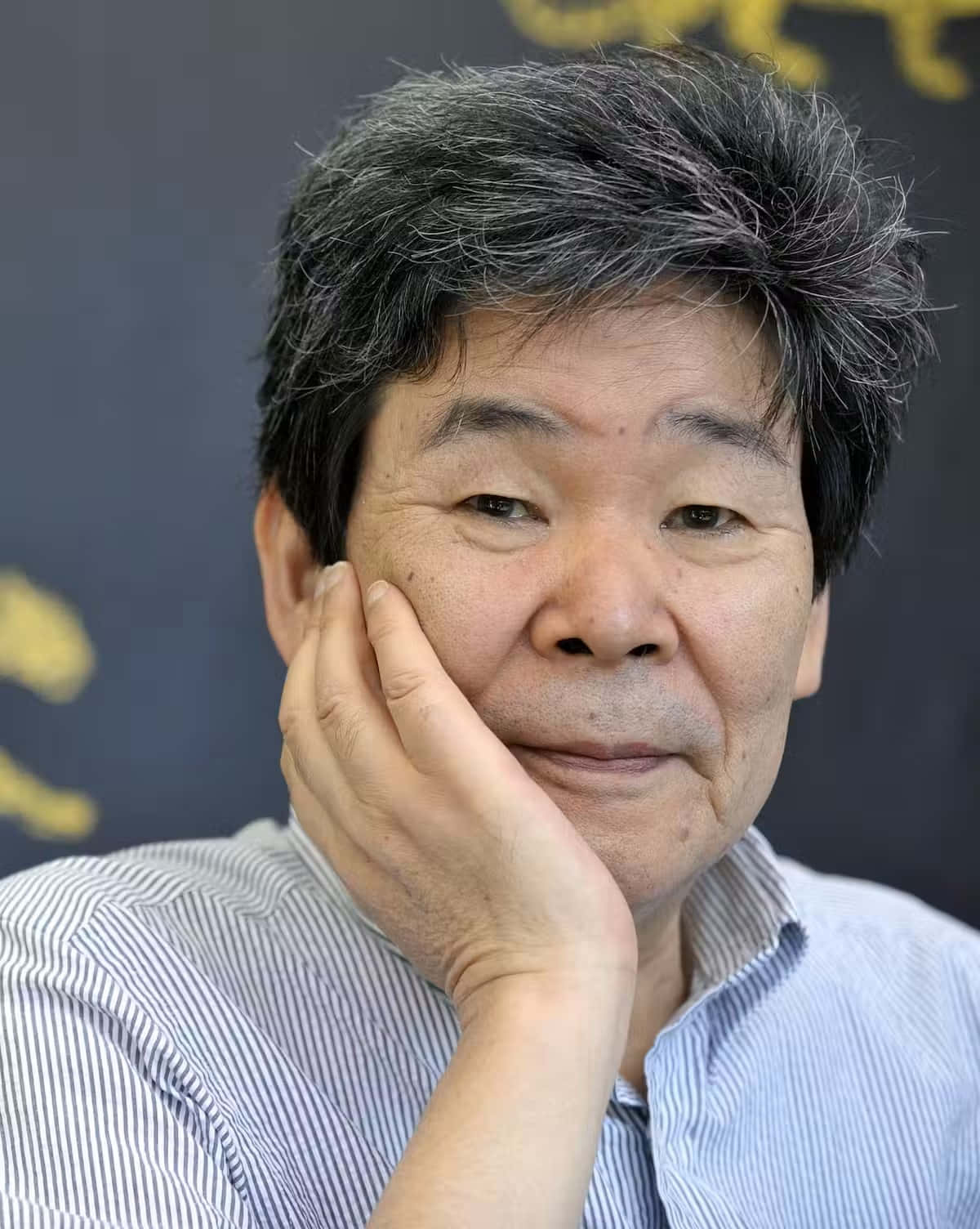 Portrait of Isao Takahata, renowned animator and co-founder of Studio Ghibli Wallpaper