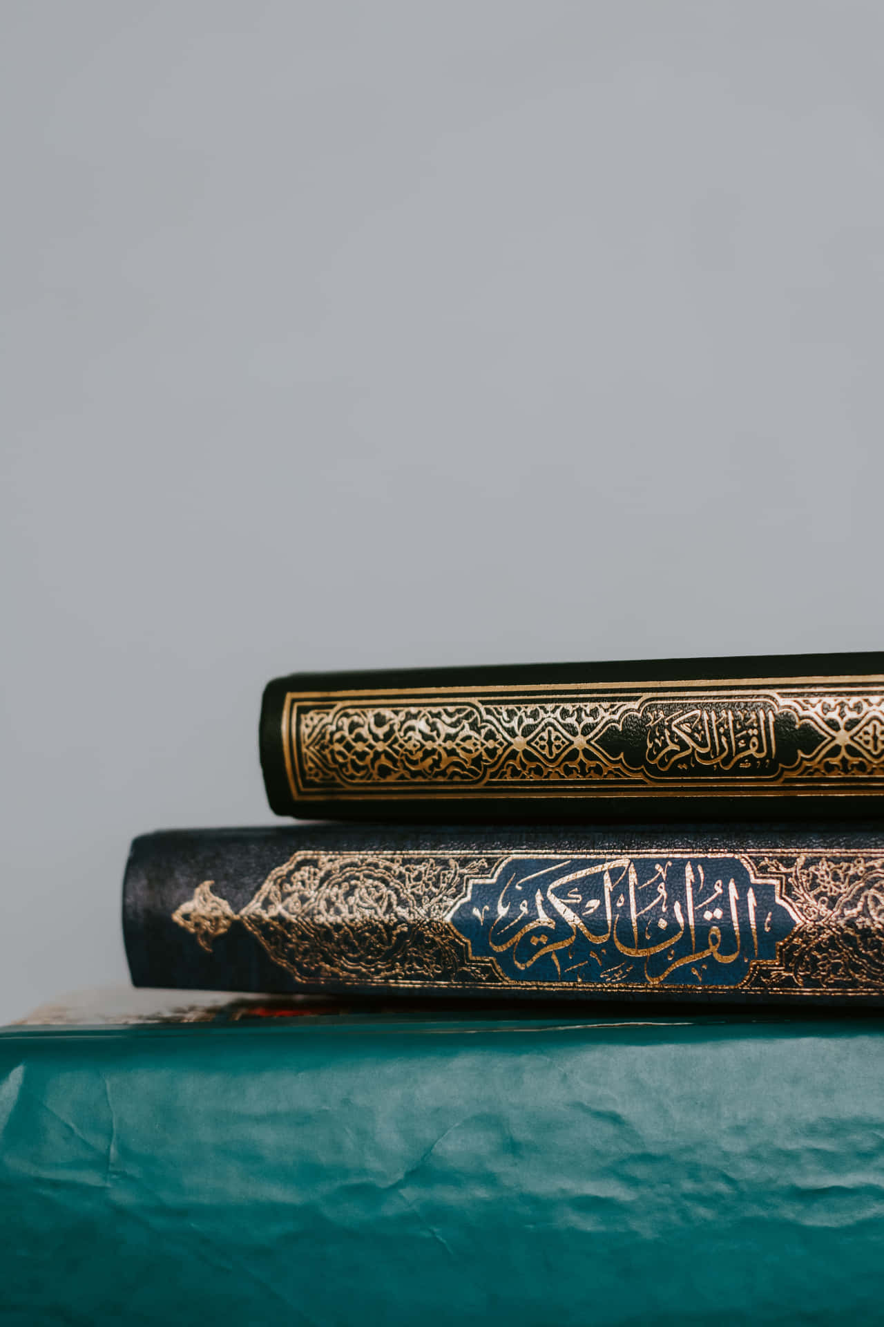 Stacked Holy Books Islamic Background