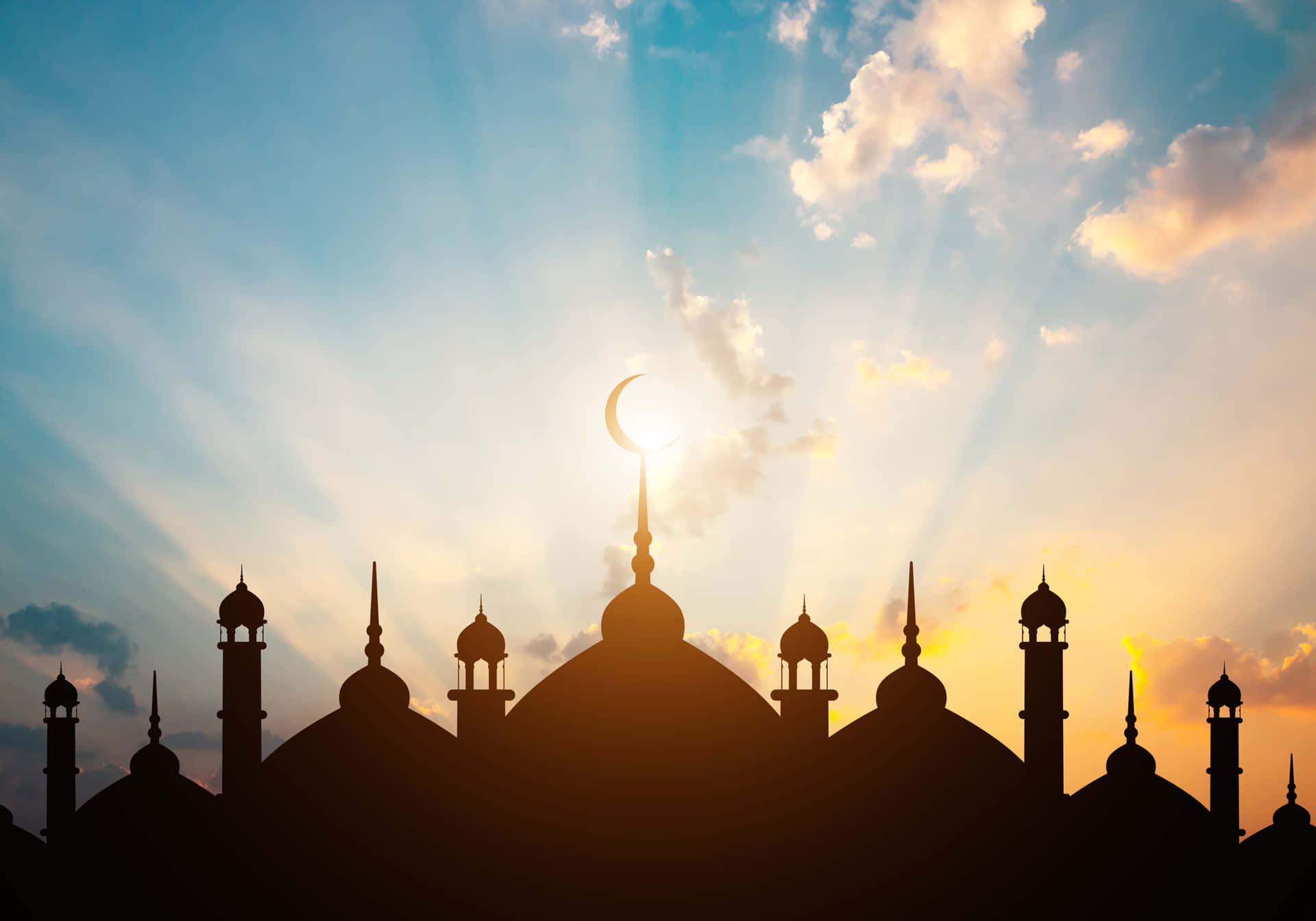 Fondode Pantalla Con Silueta De La Mezquita Badshahi Y Temática Islámica.