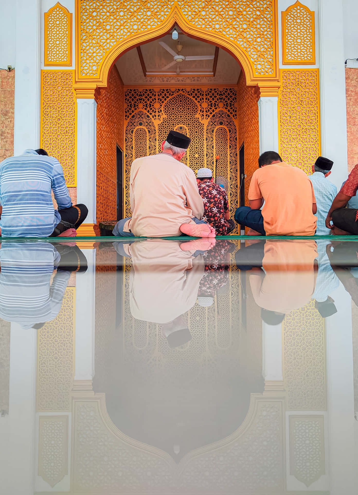 People Praying On The Floor Islamic Background