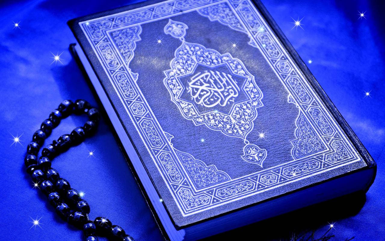 A blue book of Islamic knowledge. Wallpaper