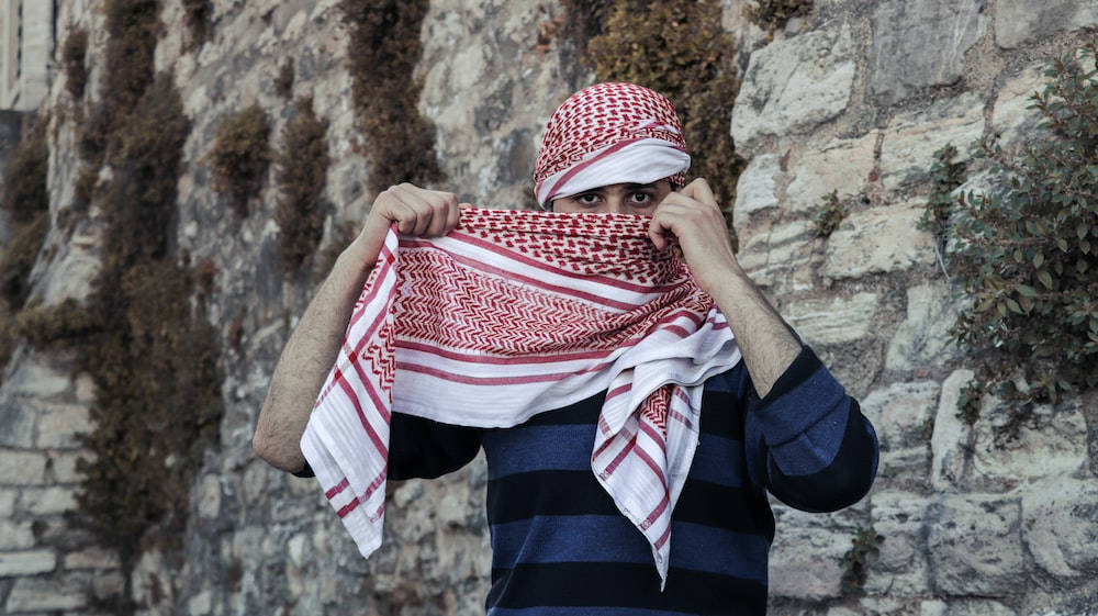 Islamic Boy Red Checkered Scarf Background