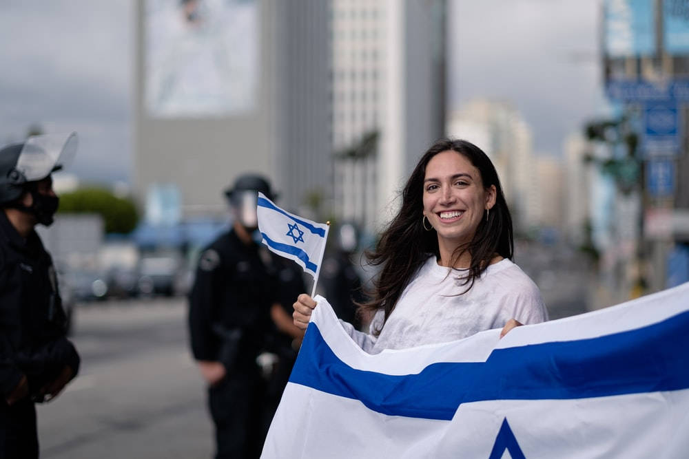 Israel Flag On Smiling Girl Wallpaper