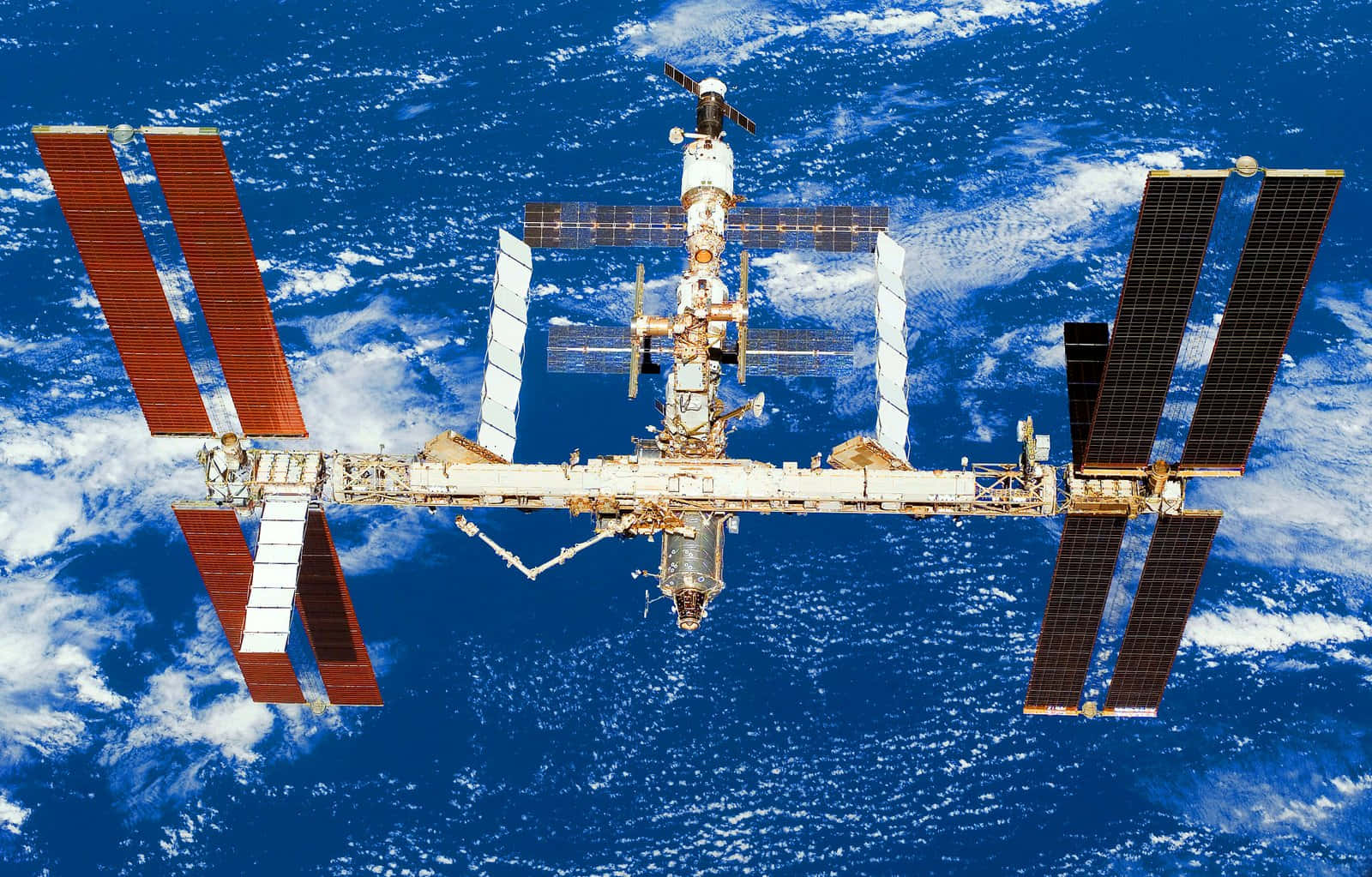 International Space Station Orbiting Earth Wallpaper