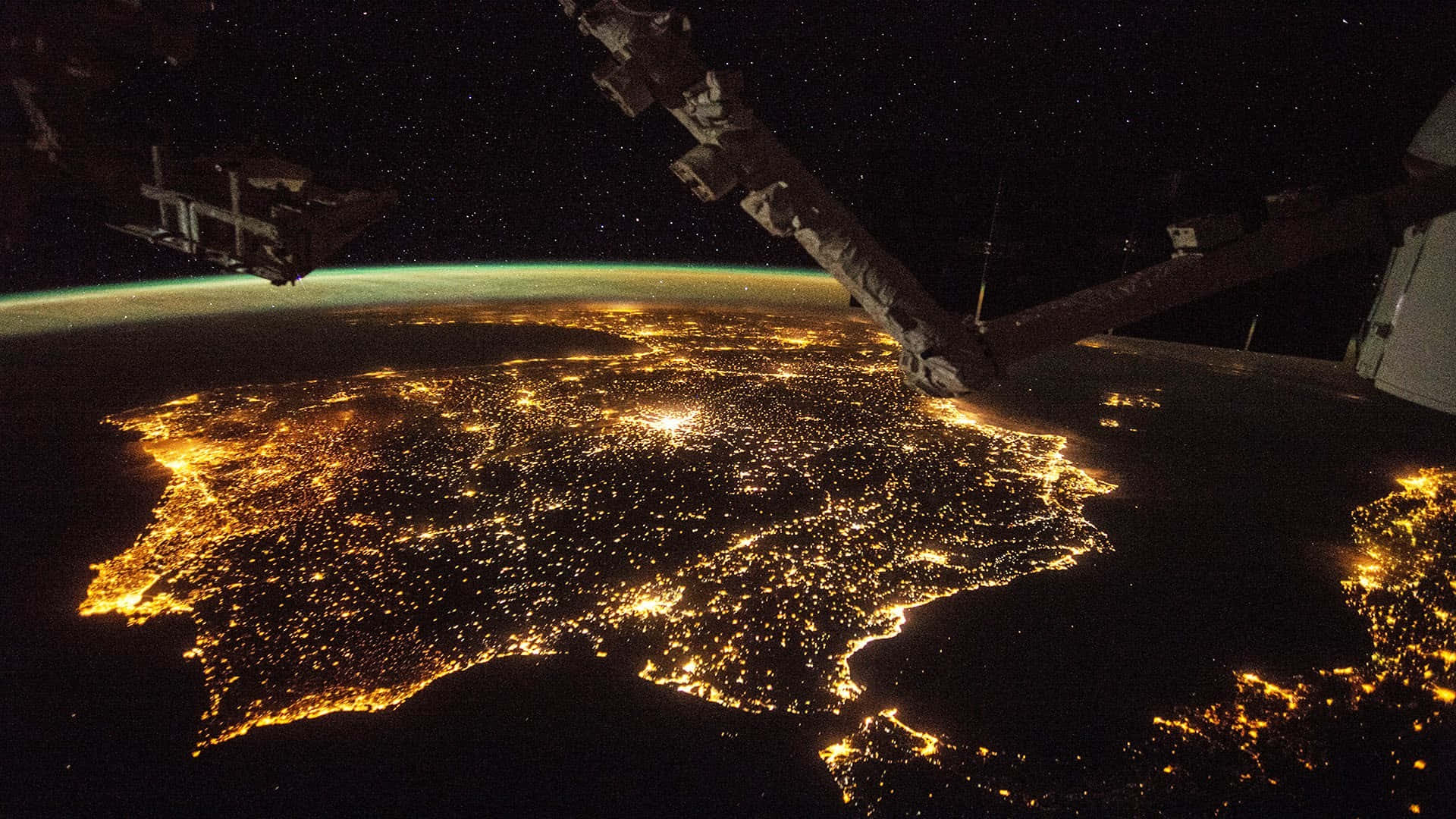 Stunning View of the International Space Station (ISS) Orbiting Earth. Wallpaper