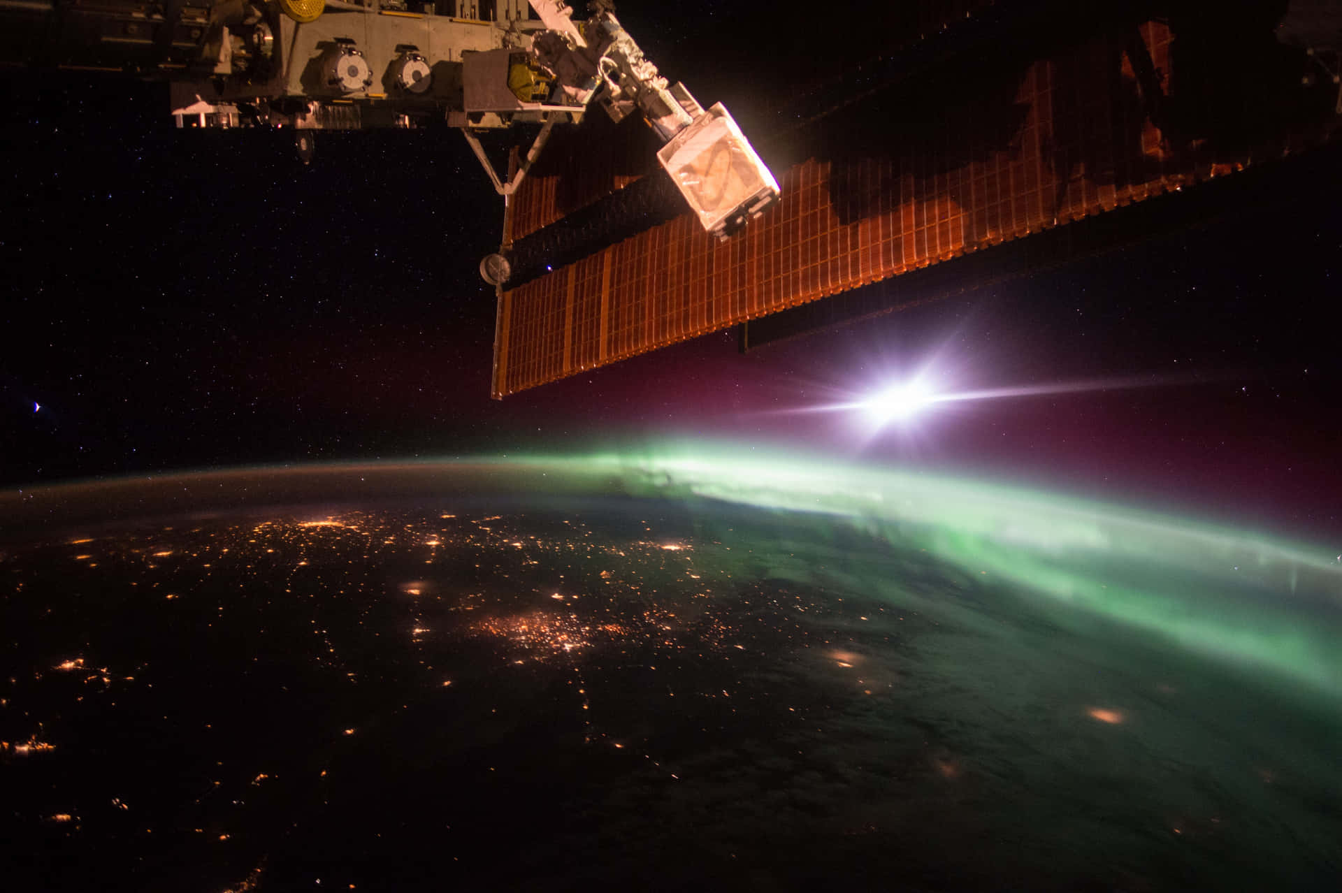 Stunning view of the International Space Station orbiting Earth Wallpaper