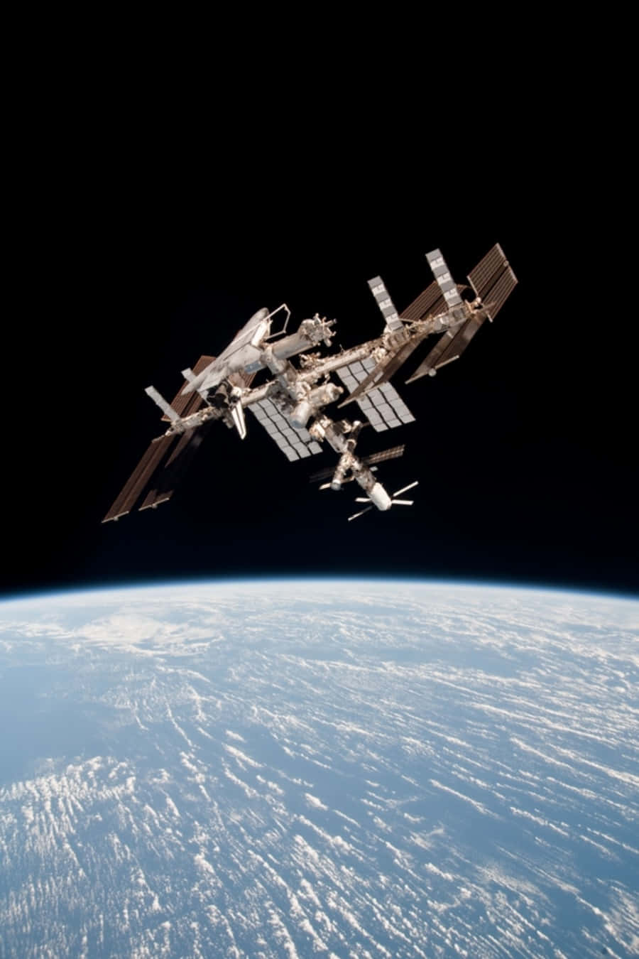 Stunning view of the International Space Station (ISS) in Earth's orbit Wallpaper