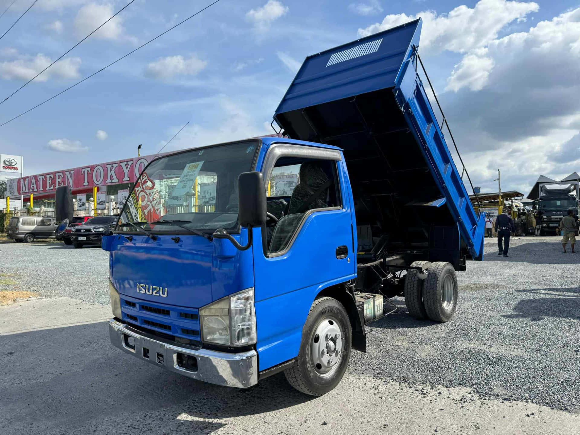 Isuzu Elf Vuilniswagen Met Kantelbed Achtergrond