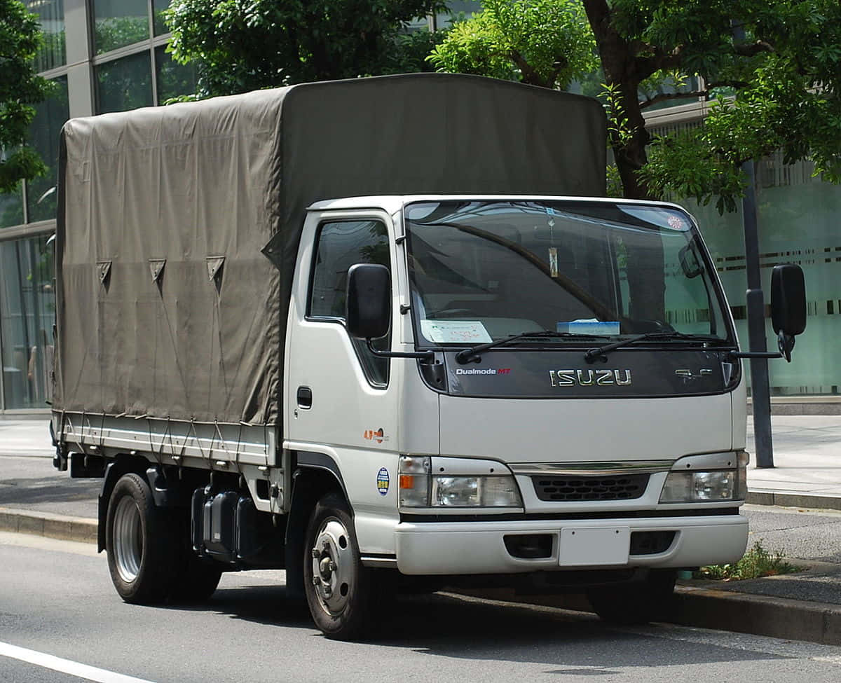 Isuzu Elf Witte Bedekte Truck Achtergrond