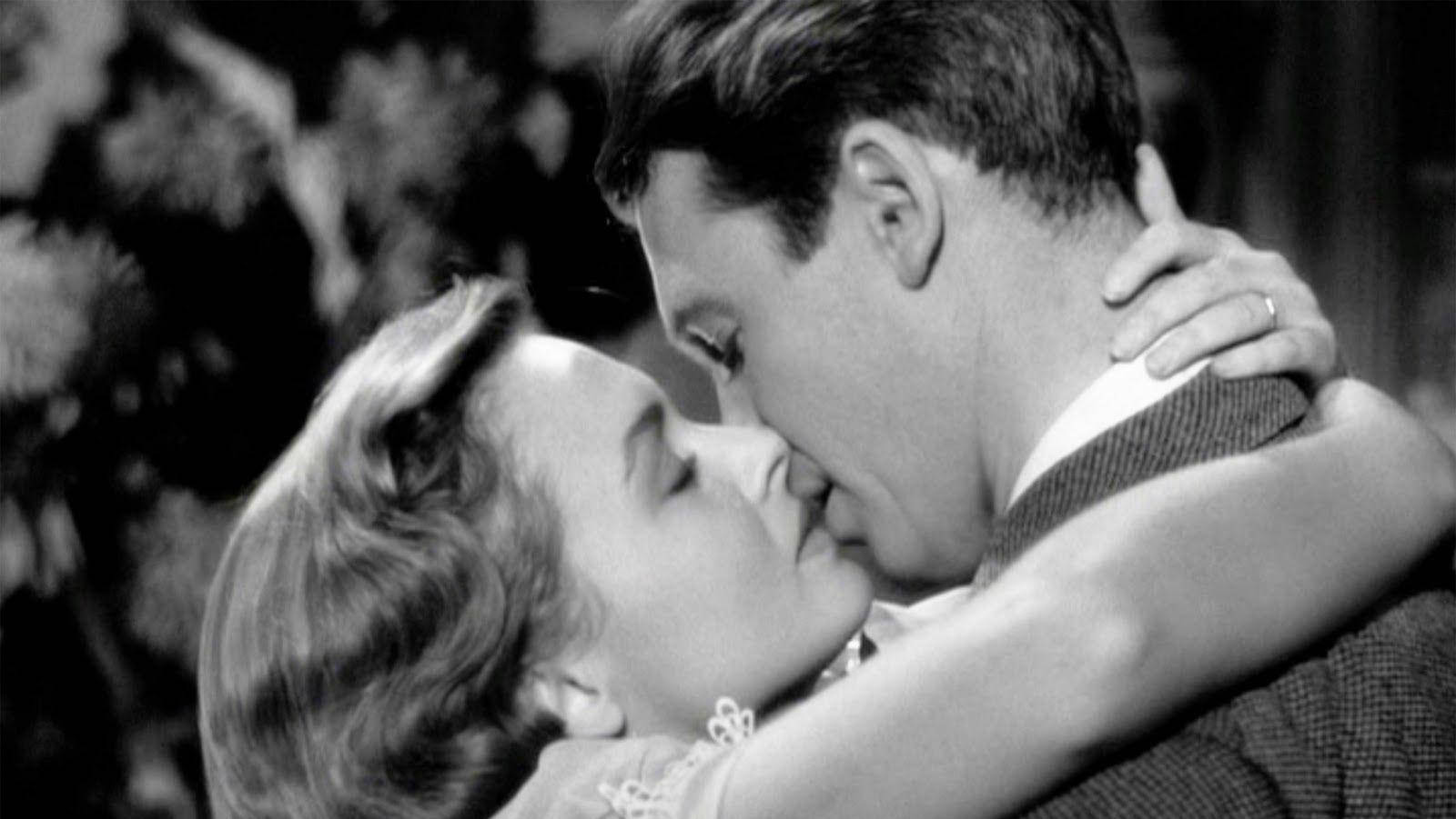 Caption: A timeless moment of love between George and Mary in "It's a Wonderful Life" Wallpaper