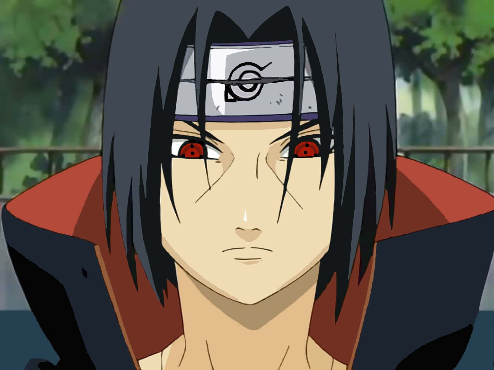 A stoic yet determined look on Itachi's face Wallpaper