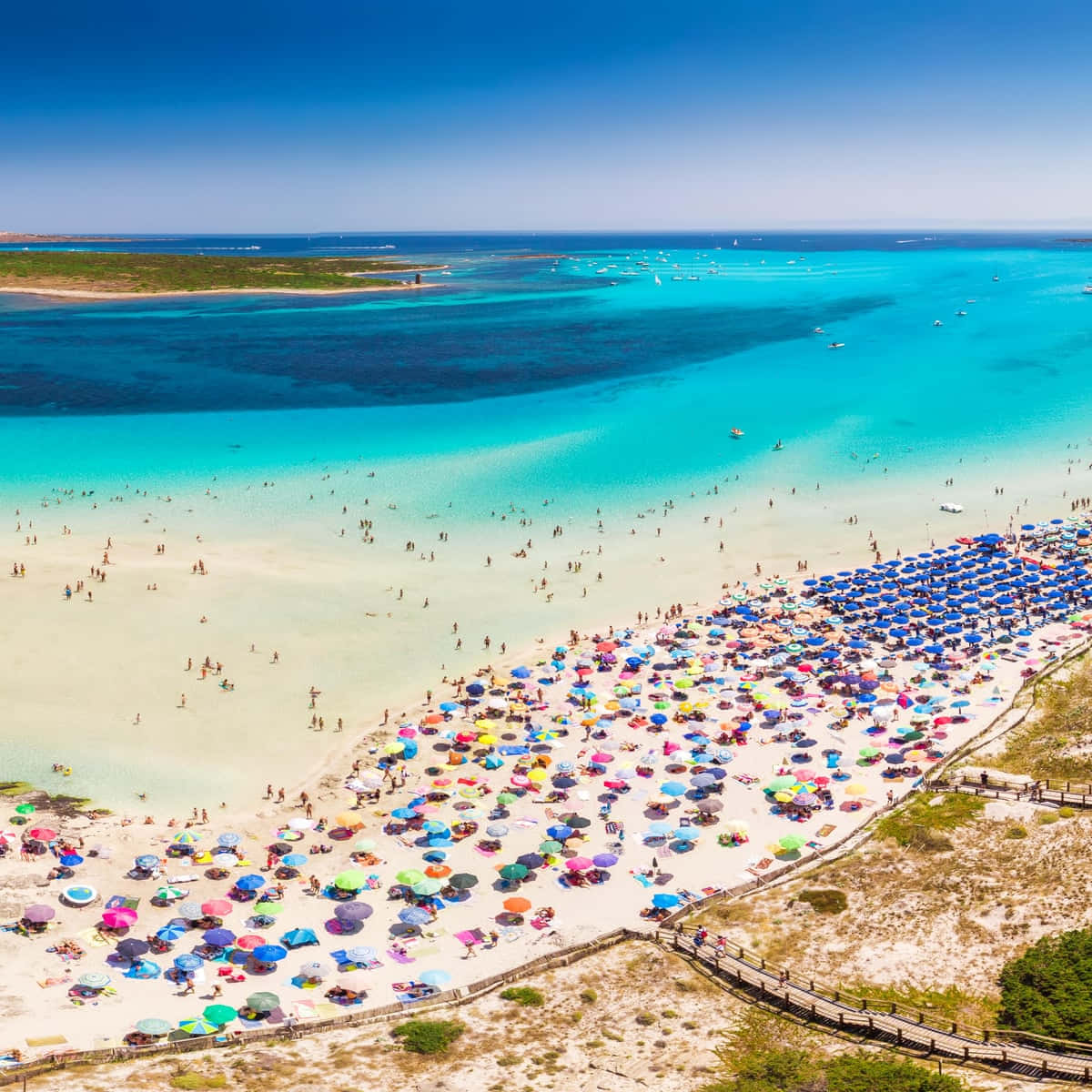 Breathtaking view of a pristine Italian beach Wallpaper
