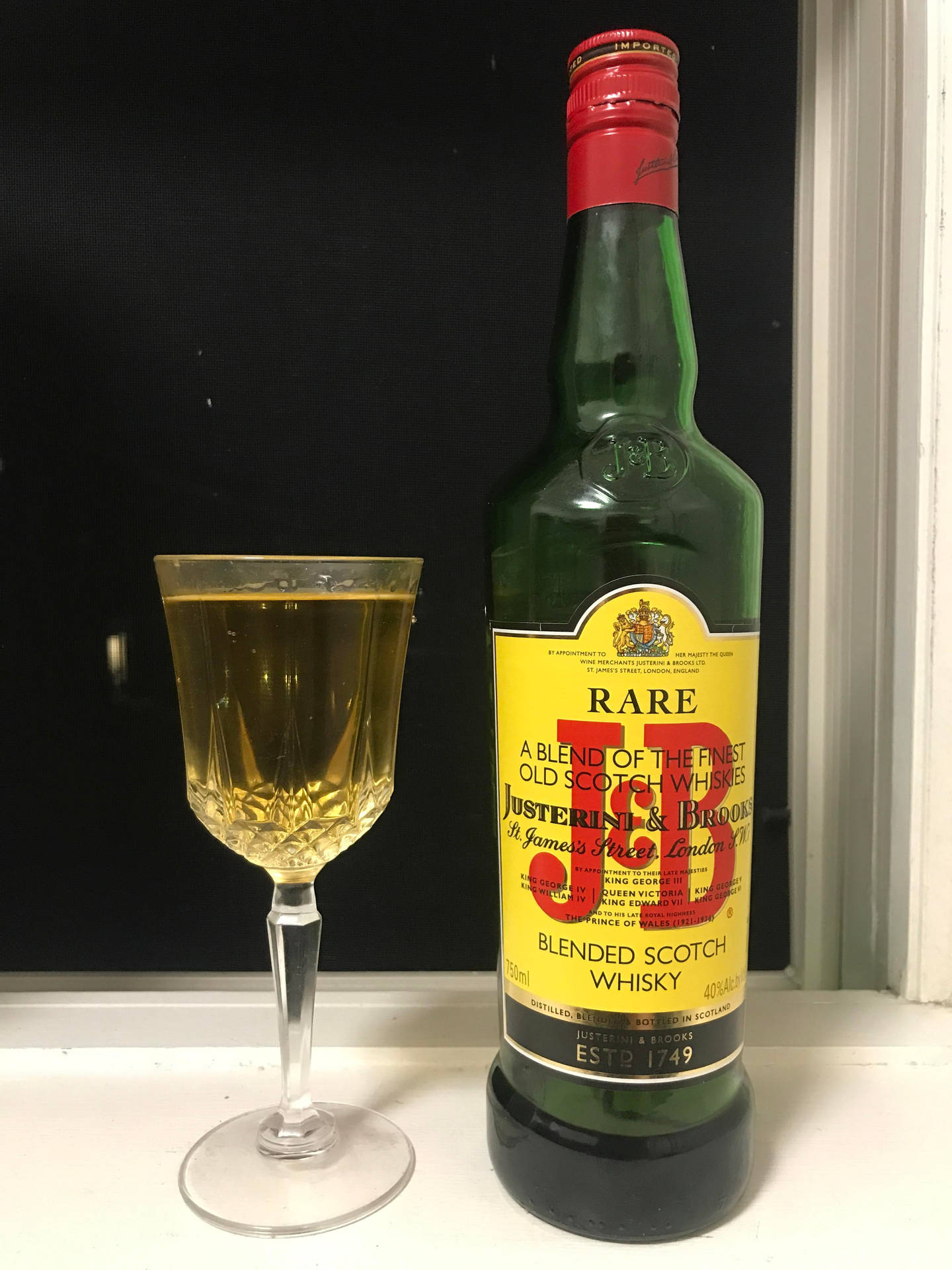 J&B Blended Scotch Whisky Bottle with Glass Wallpaper