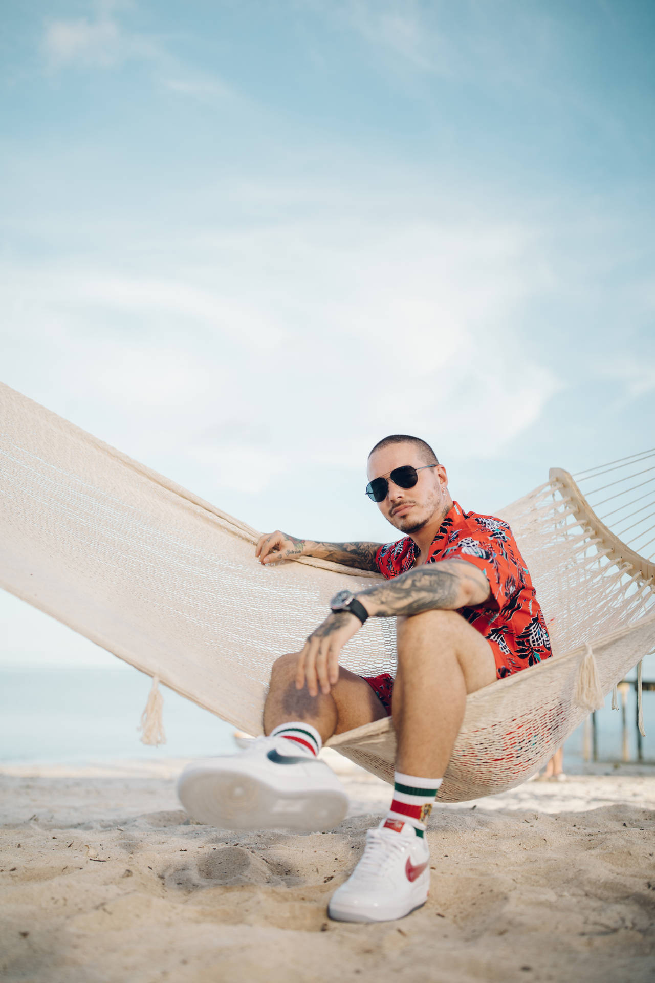J Balvin At The Beach Background