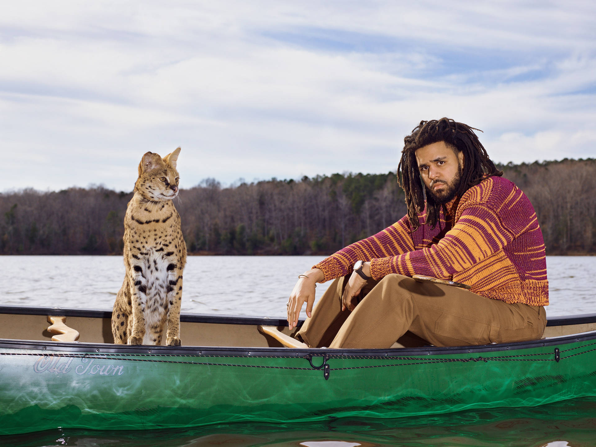 J Cole On A Boat Background